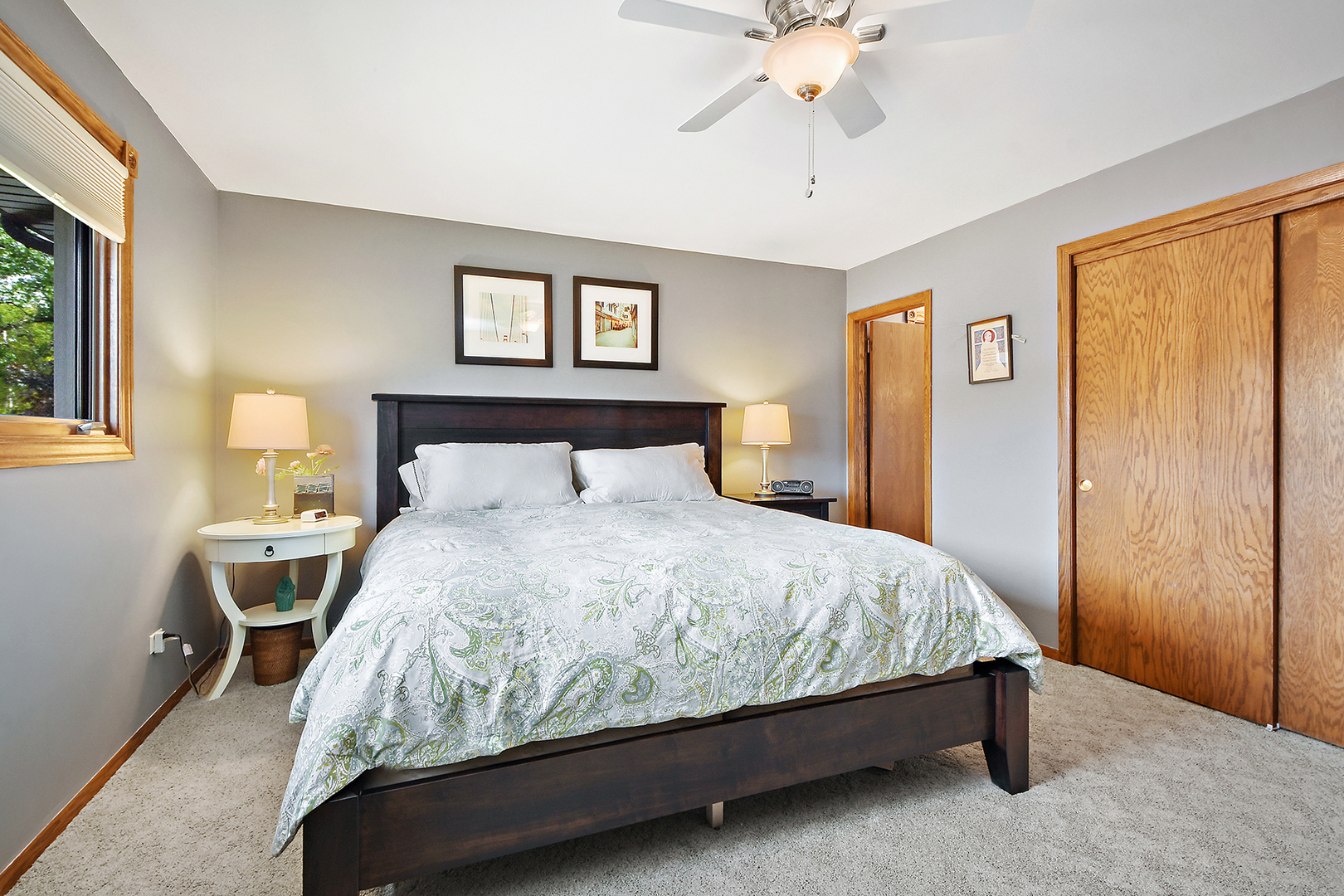 10918 3rd Street Mokena, IL 60448 - Photo 29 of 40 a bedroom with a bed and window