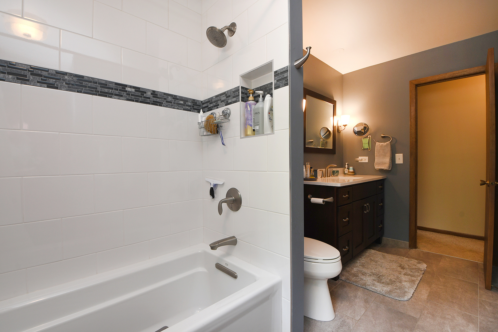 10918 3rd Street Mokena, IL 60448 - Photo 31 of 40 a bathroom with a granite countertop sink a toilet and shower