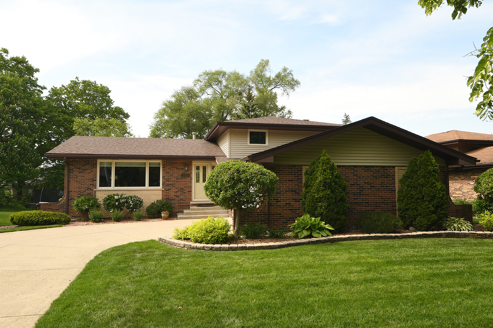 10918 3rd Street Mokena, IL 60448 - Photo 7 of 40 a view of a house with backyard and garden