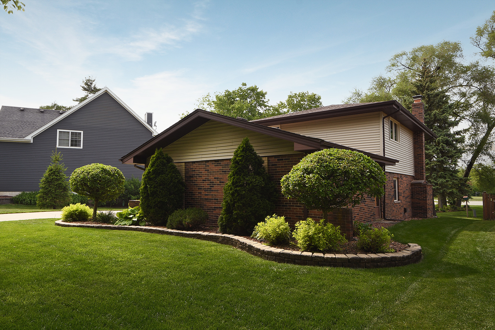 10918 3rd Street Mokena, IL 60448 - Photo 9 of 40 a front view of a house with a yard