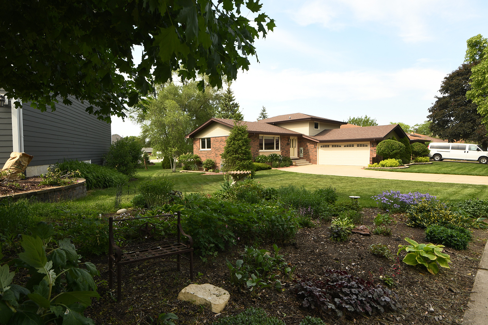 10918 3rd Street Mokena, IL 60448 - Photo 10 of 40 a view of a house with a yard and sitting area