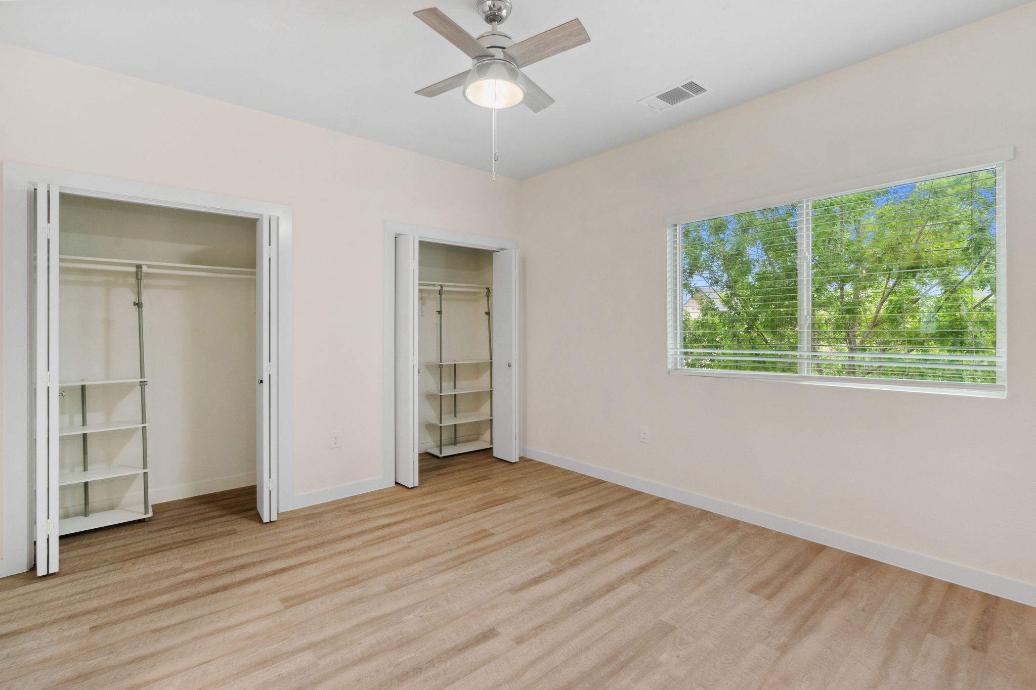7805 Cooper Lane, Unit 606 Austin, TX 78745 - Photo 21 of 35 wooden floor in an empty room with a window