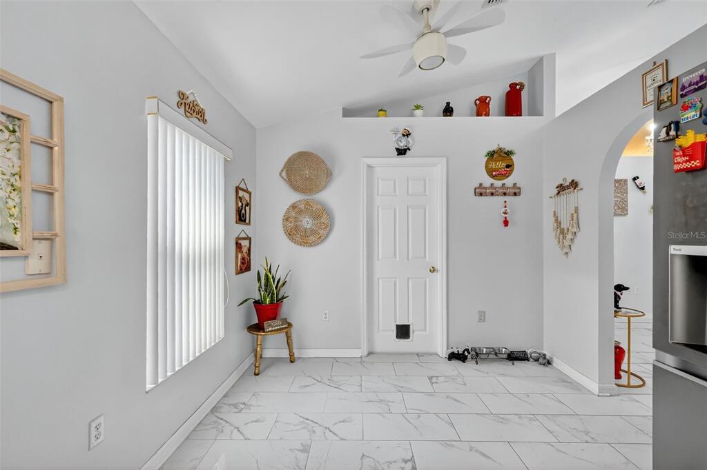 2442 Foxhollow Road Tavares, FL 32778 - Photo 20 of 28 a view of an entryway with wooden floor