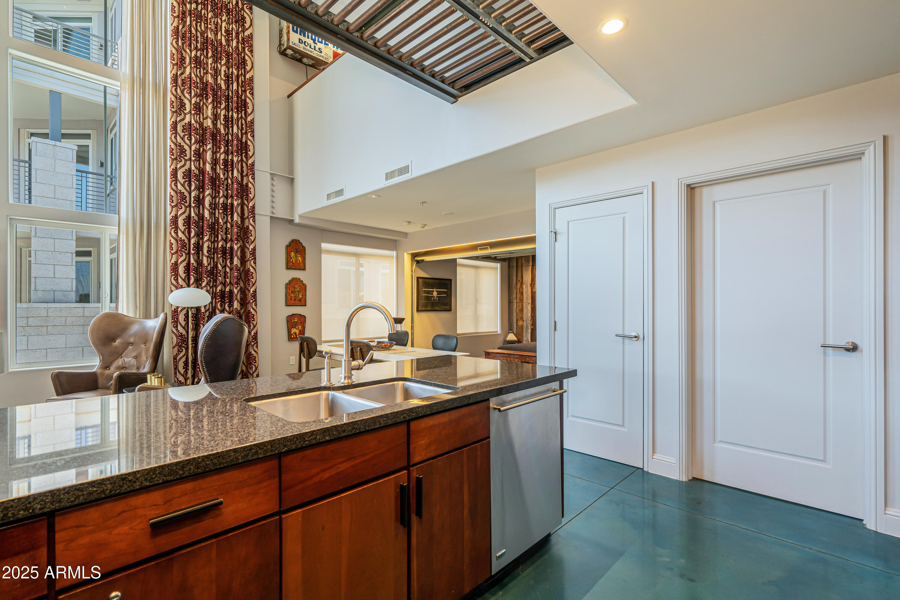 7033 East Main Street, Unit A200 Scottsdale, AZ 85251 - Photo 7 of 58 Doors to pantry and laundry