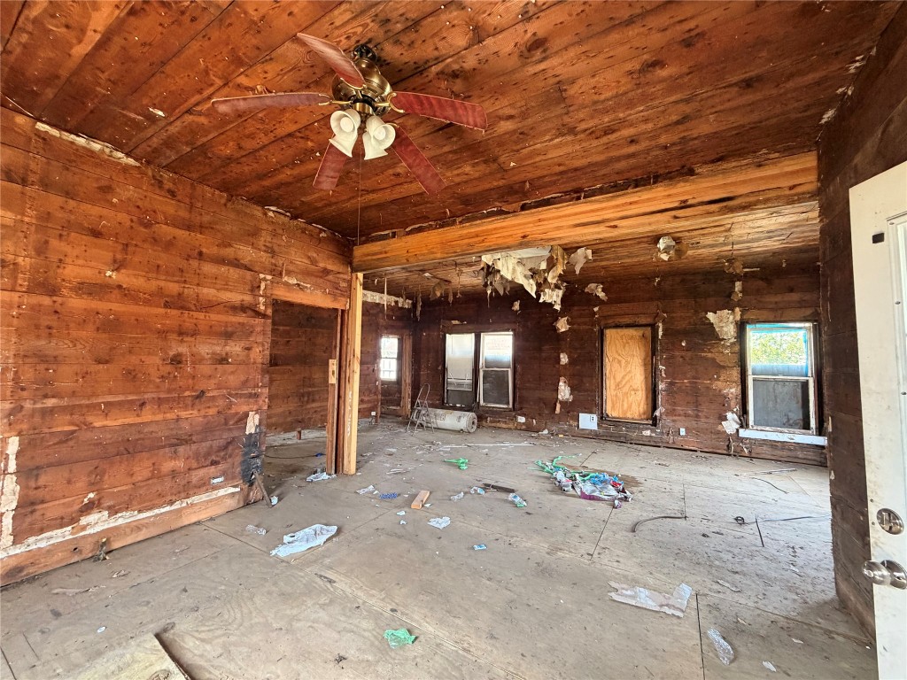 118 Van Molan Street Houston, TX 77022 - Photo 2 of 15 a view of a room with wooden walls
