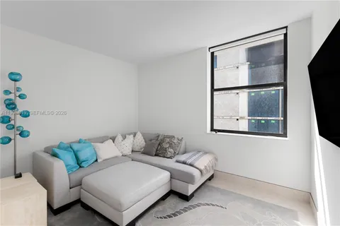 a bedroom with a bed and closet