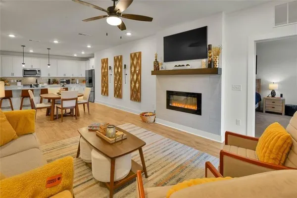 a view of a chairs and table in patio