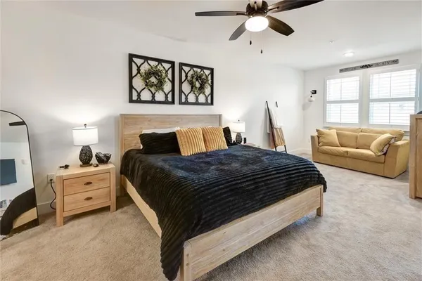 a spacious bathroom with a double vanity sink and a mirror
