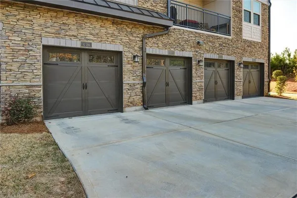 a room with gym equipment and windows