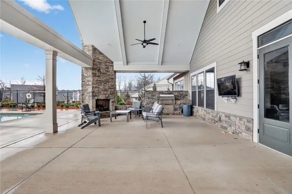 a front view of house with yard and car parked