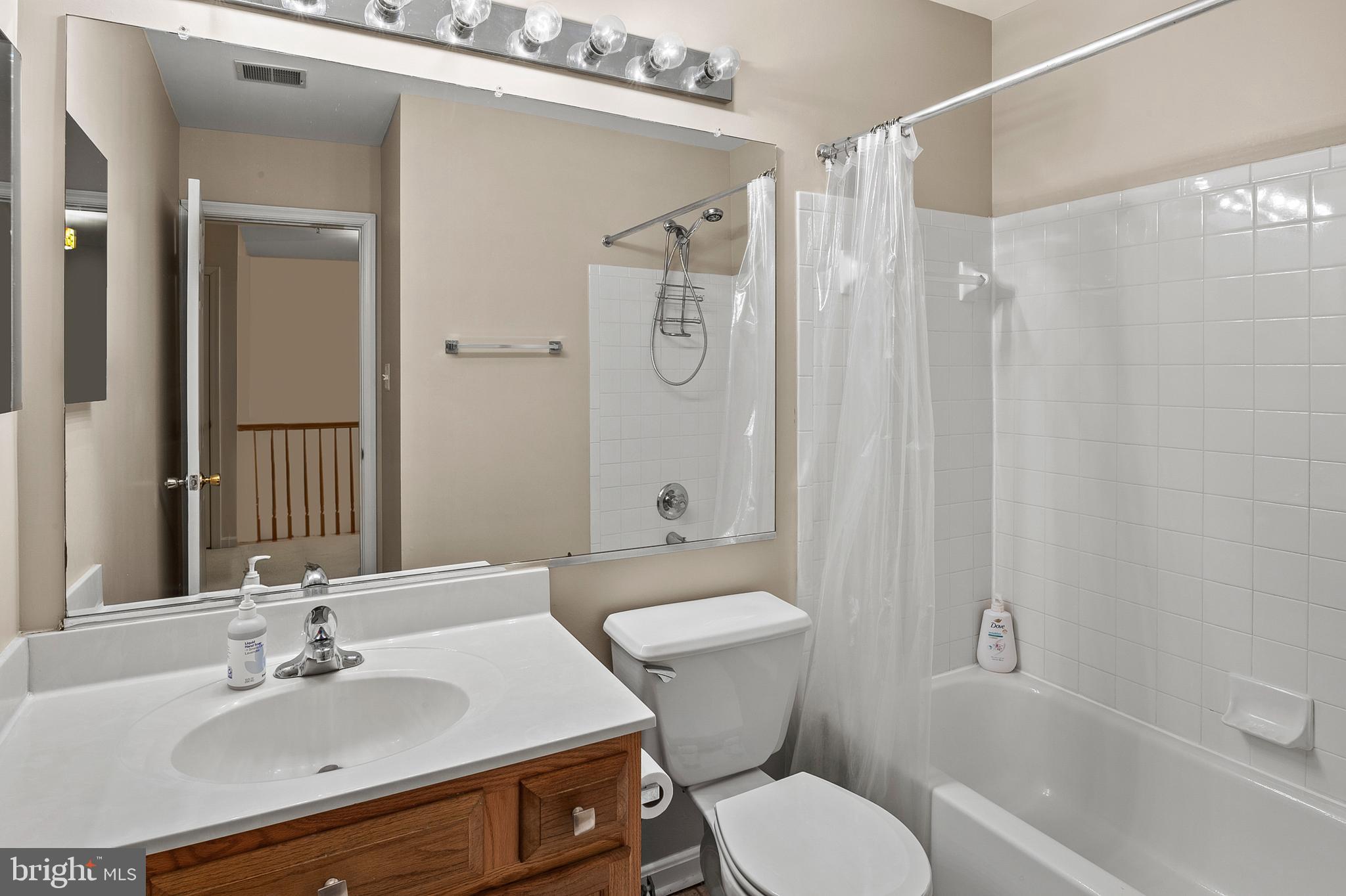 2720 Summers Ridge Drive Odenton, MD 21113 - Photo 21 of 29 a bathroom with a sink toilet and shower