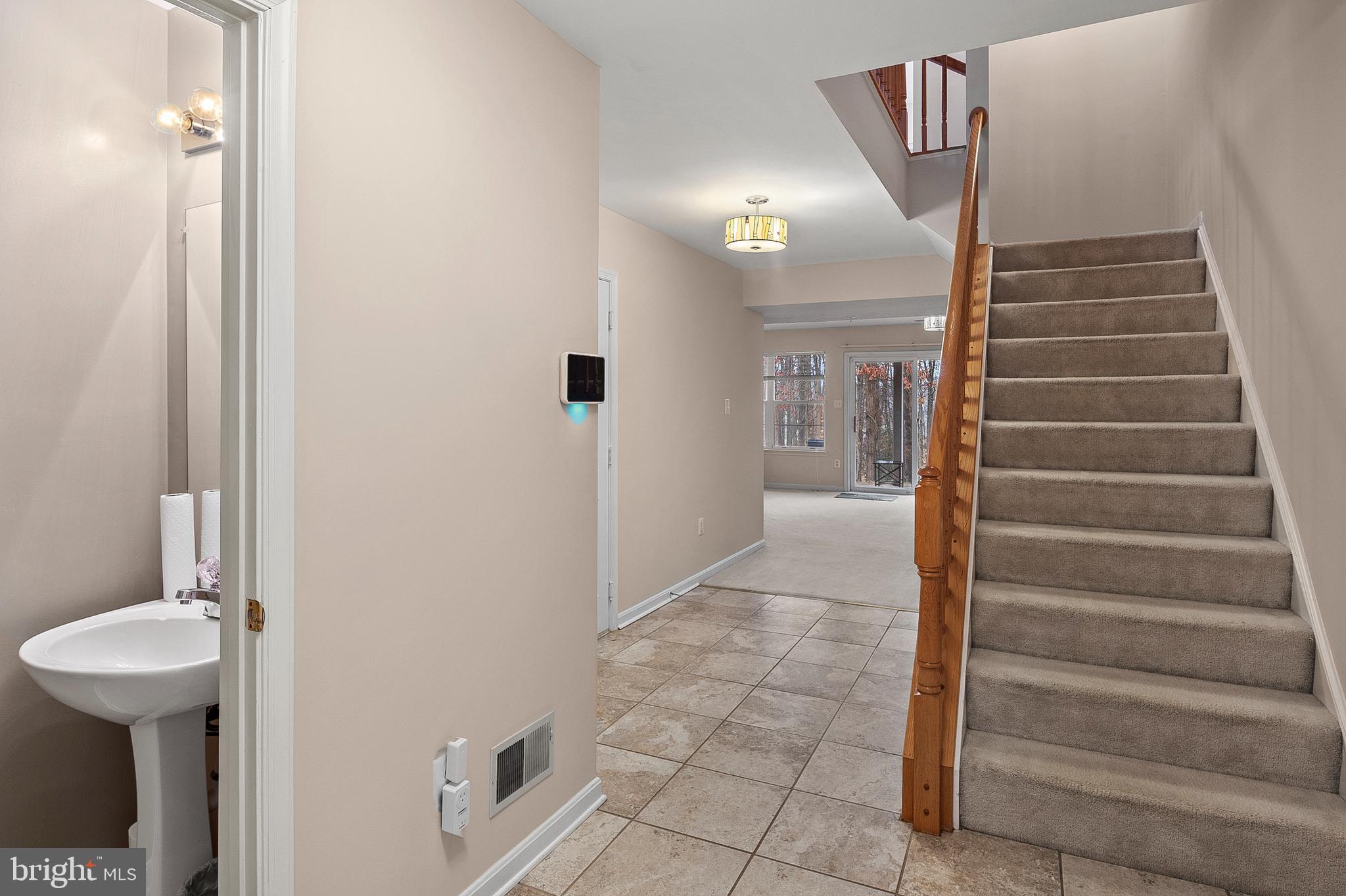 2720 Summers Ridge Drive Odenton, MD 21113 - Photo 2 of 29 a view of entryway and hall with wooden floor