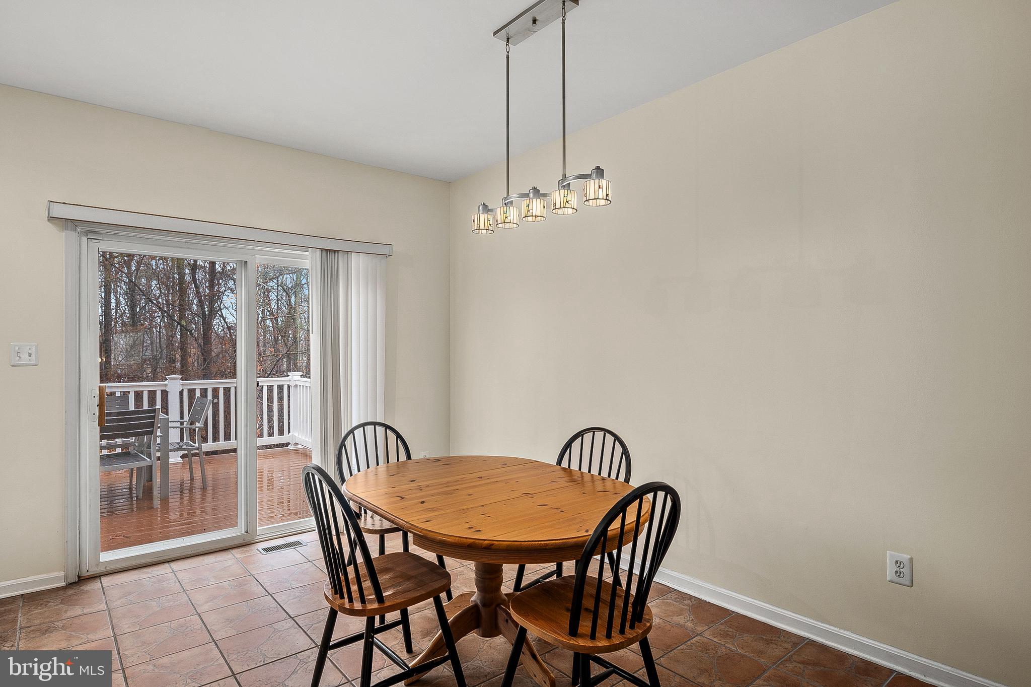 2720 Summers Ridge Drive Odenton, MD 21113 - Photo 7 of 29 a view of a dining room with furniture window and wooden floor