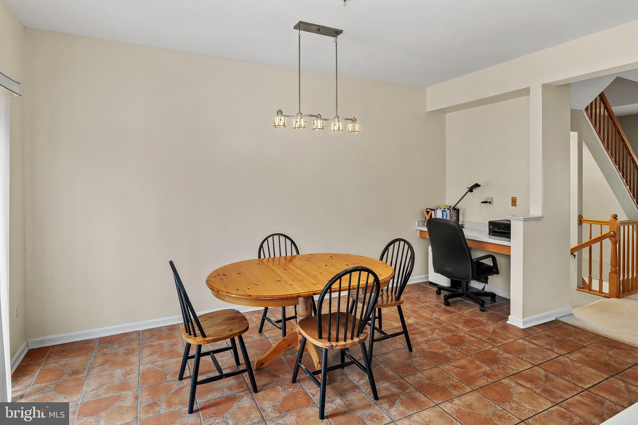 2720 Summers Ridge Drive Odenton, MD 21113 - Photo 8 of 29 a dining room with furniture and a fireplace