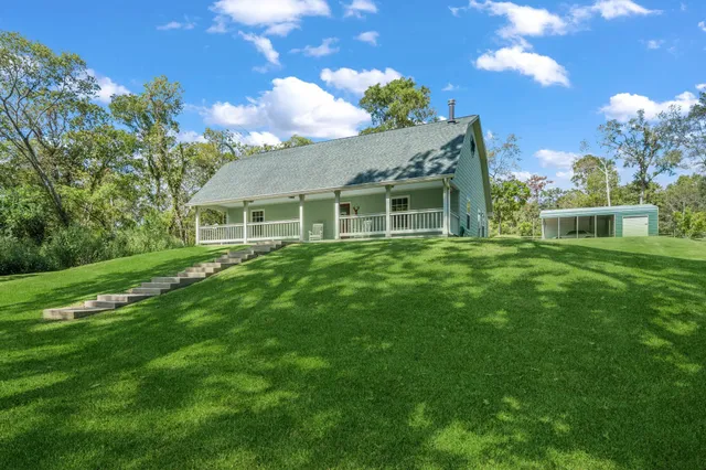 a house with garden in front of it