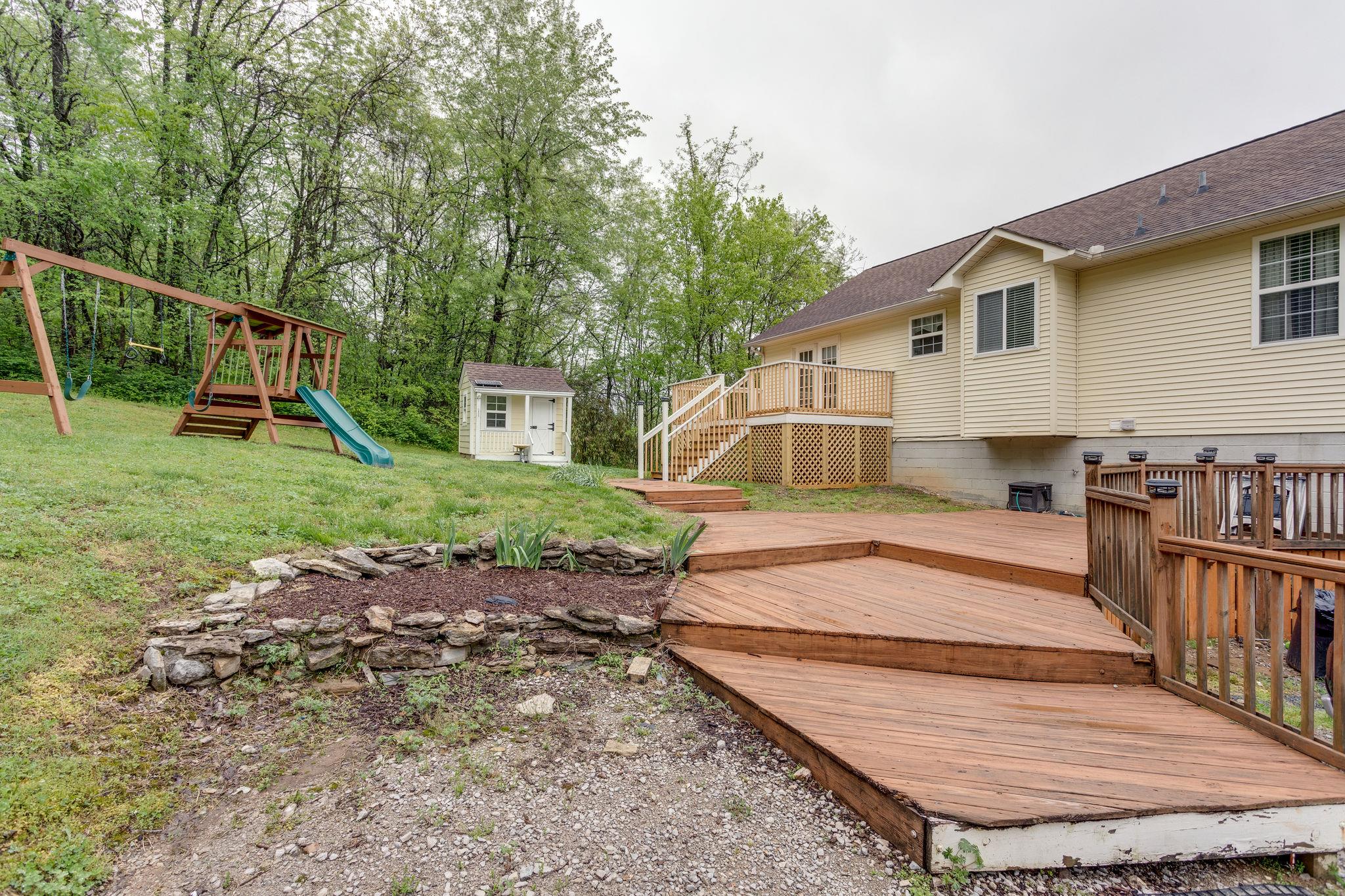 1489 Center Star Road Columbia, TN 38401 - Photo 8 of 27 a view of a house with backyard and sitting area