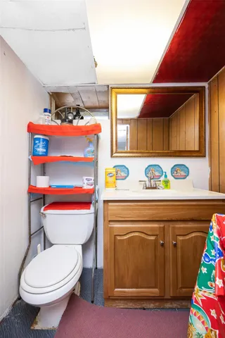 a view of a house with a flower garden