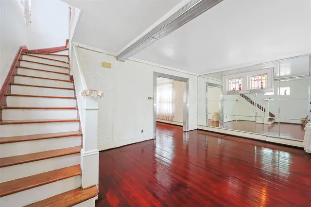 a view of entryway with wooden floor
