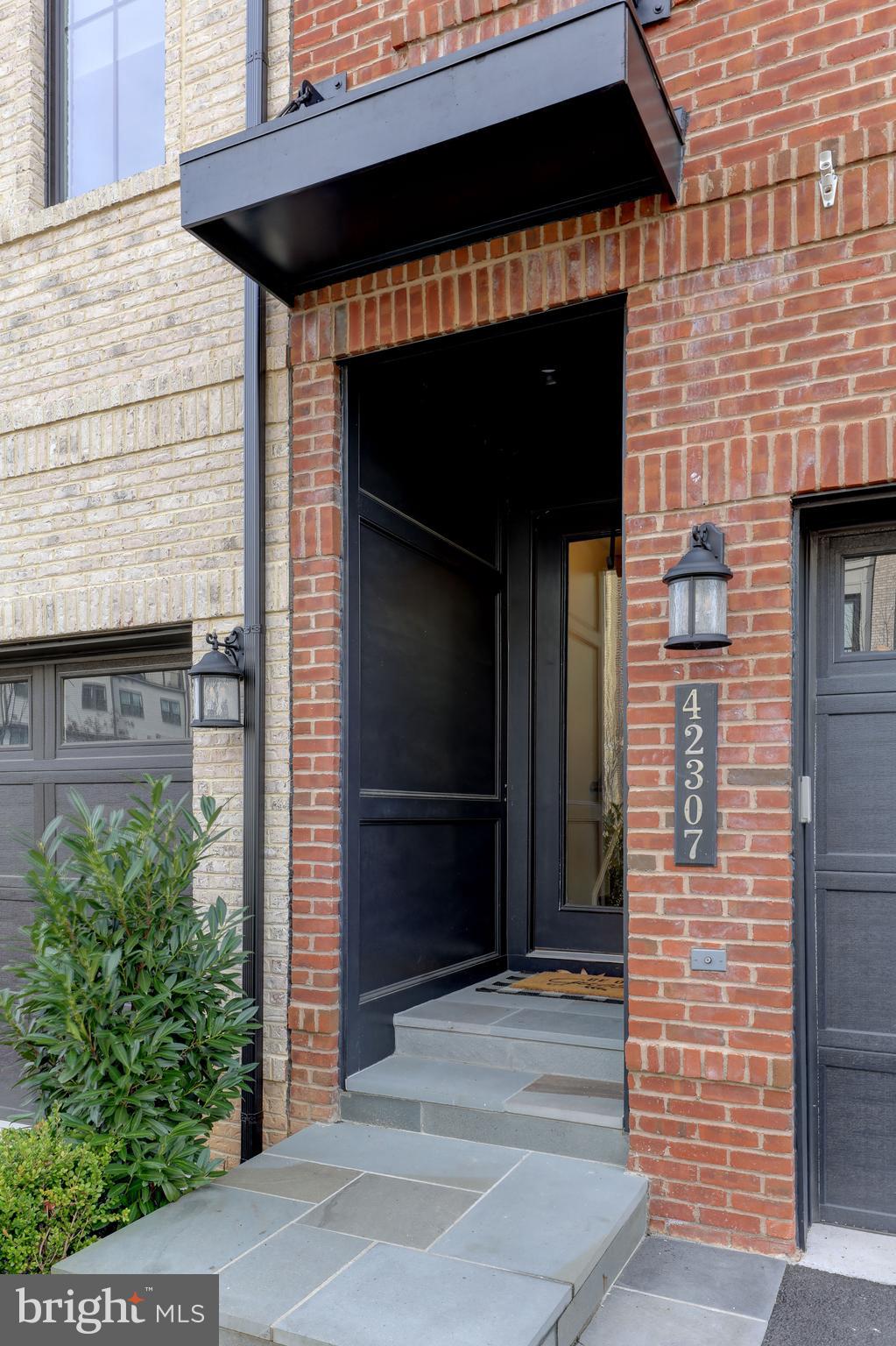 42307 Impervious Terrace Brambleton, VA 20148 - Photo 4 of 54 modern style entrance