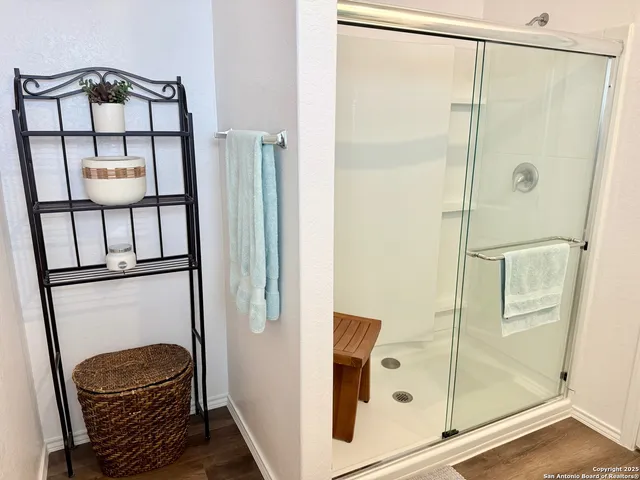 a en suite bathroom with a tub and shower