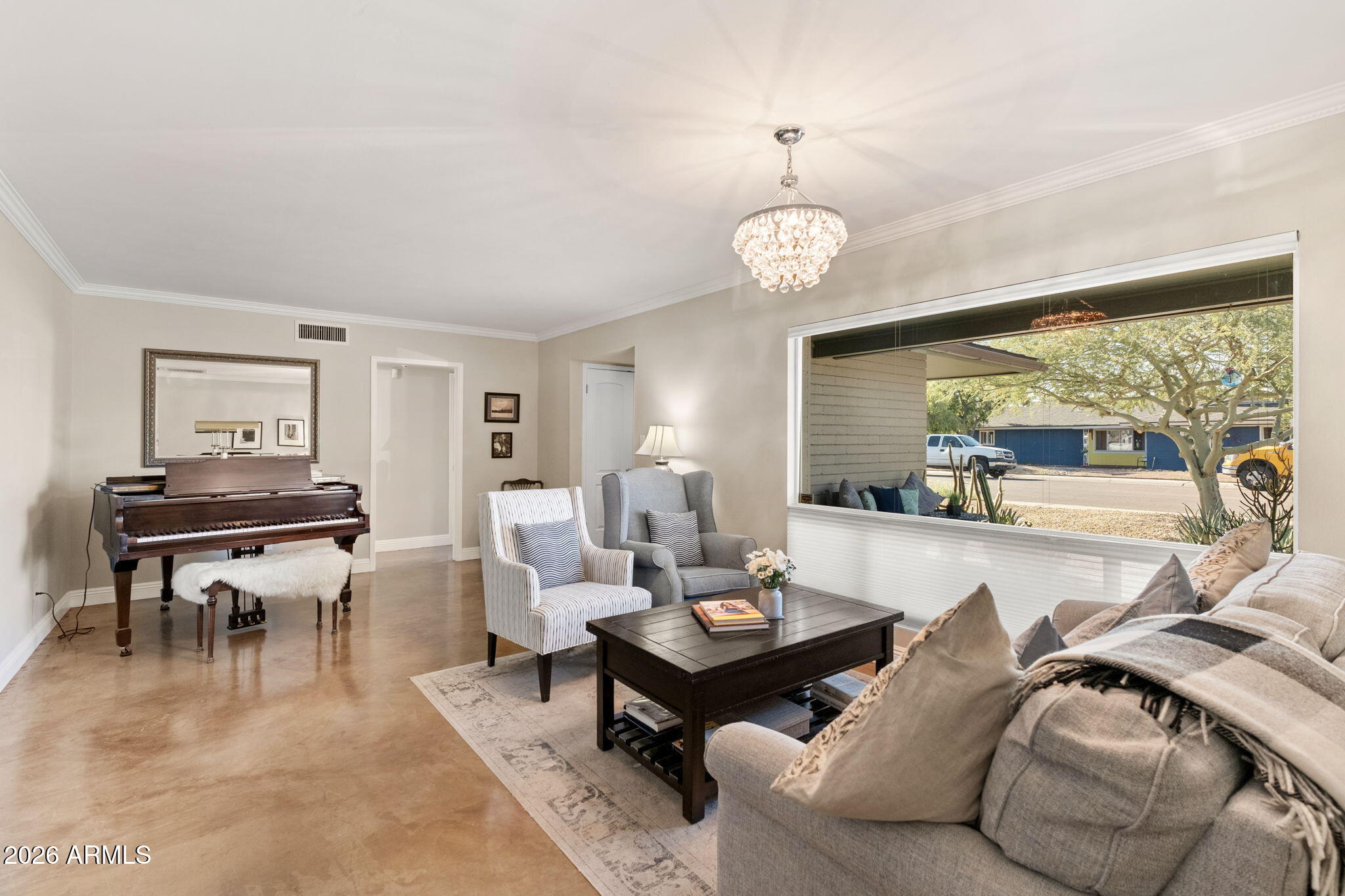 4901 North 82nd Street Scottsdale, AZ 85251 - Photo 10 of 48 a living room with furniture a large window and a table