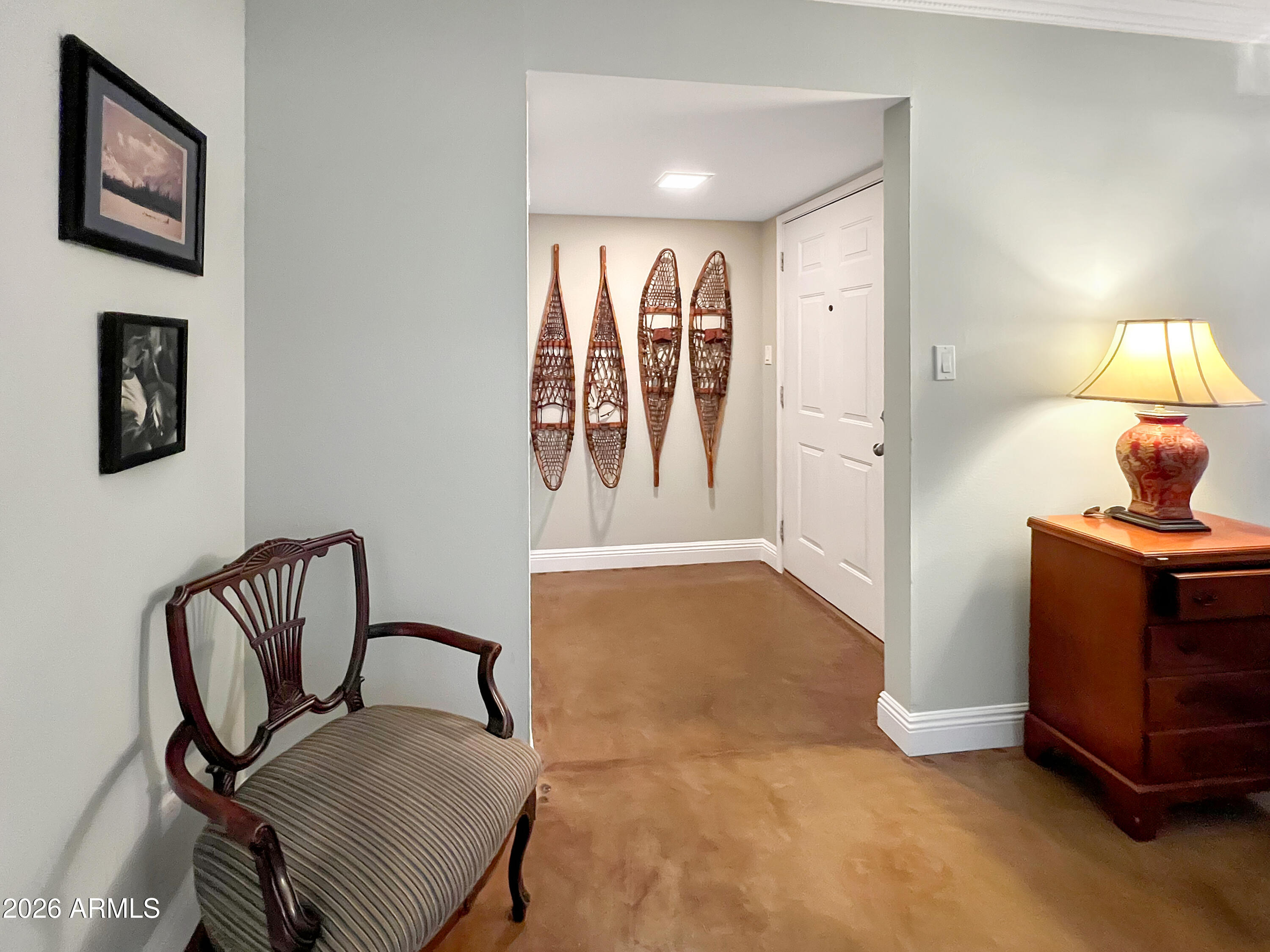 4901 North 82nd Street Scottsdale, AZ 85251 - Photo 11 of 48 a living room with furniture and a lamp