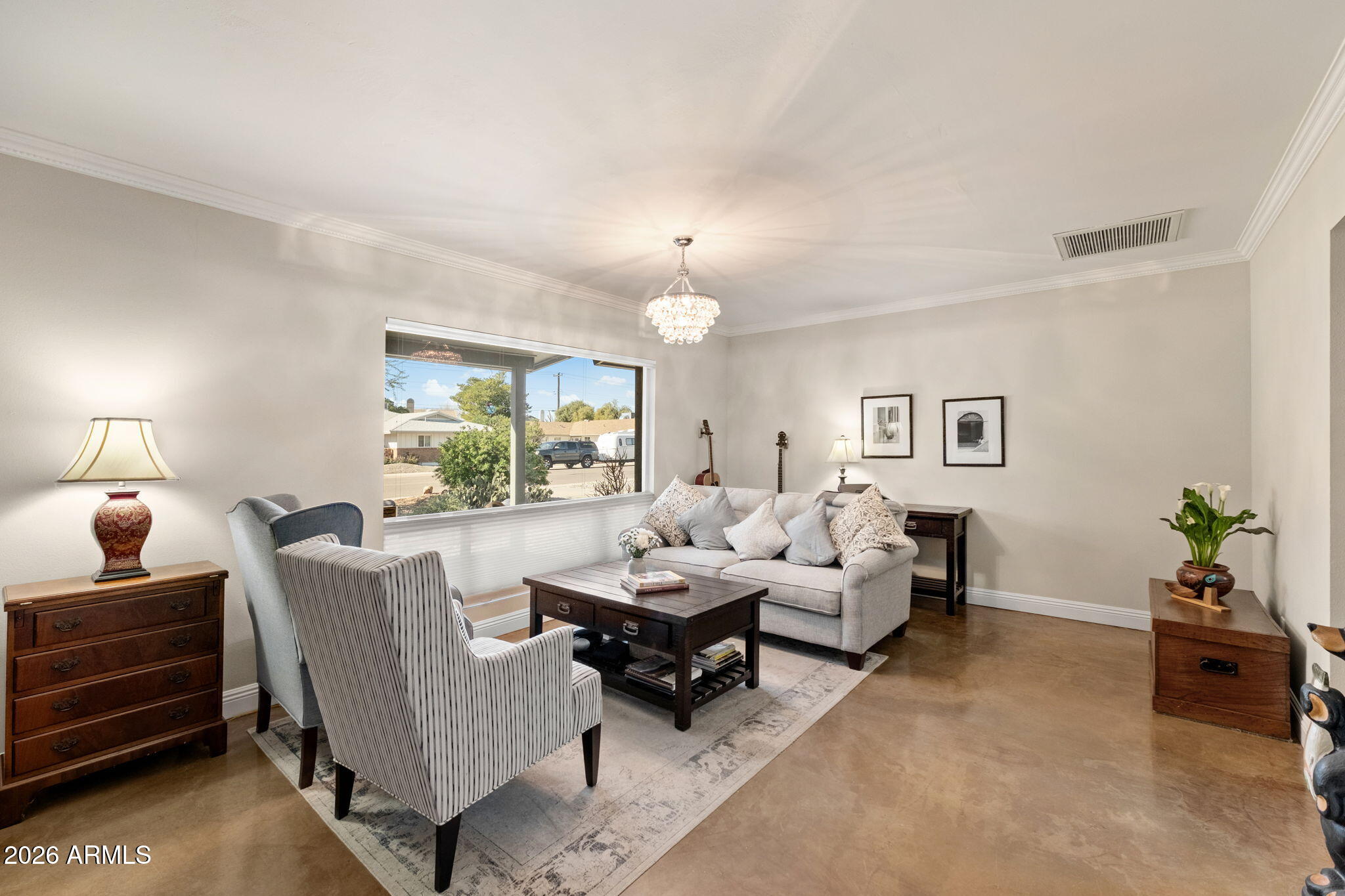 4901 North 82nd Street Scottsdale, AZ 85251 - Photo 12 of 48 a living room with furniture and a large window