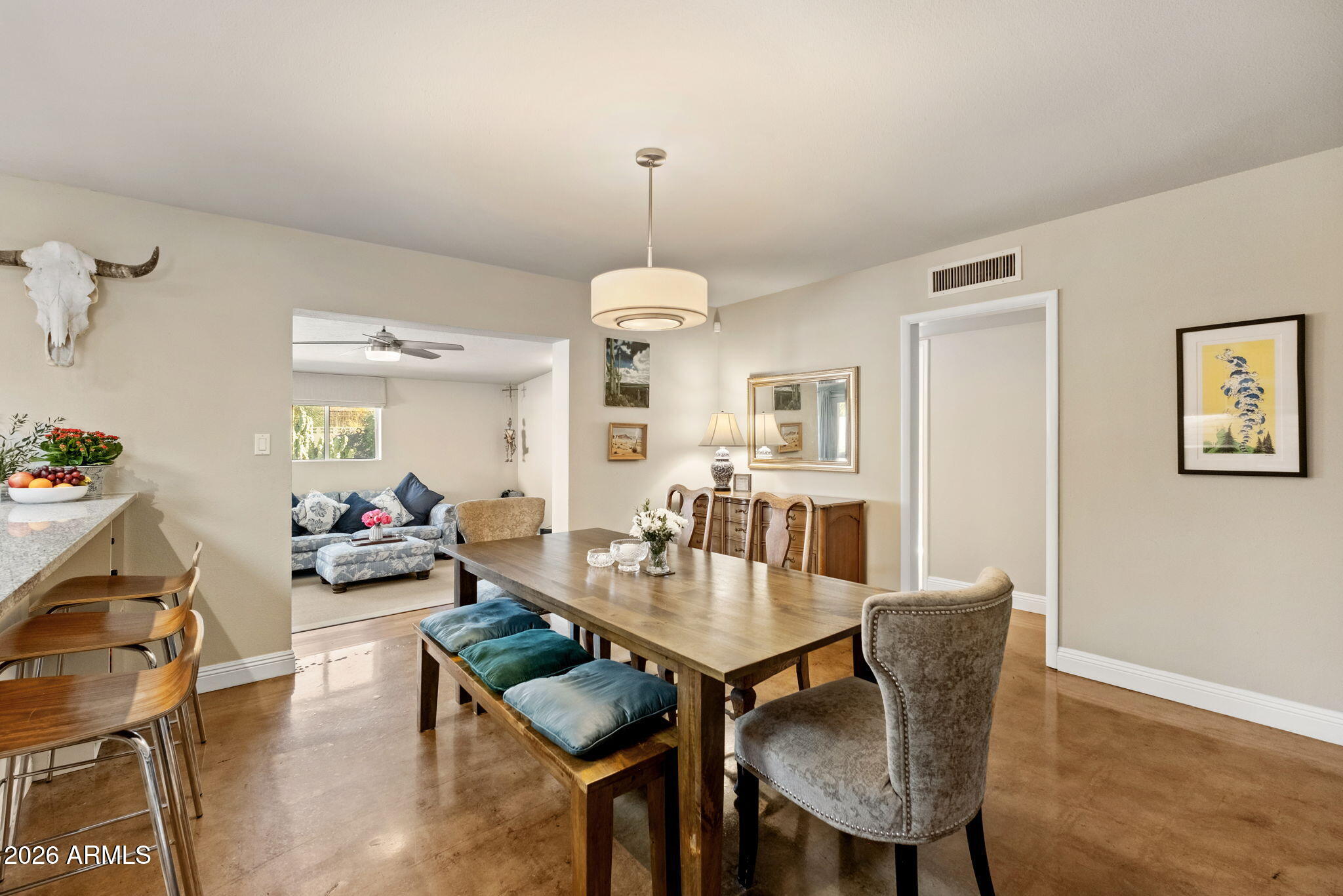 4901 North 82nd Street Scottsdale, AZ 85251 - Photo 13 of 48 a view of a dining room with furniture and wooden floor