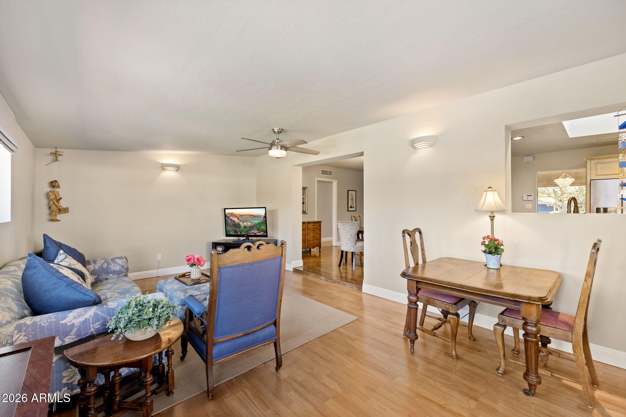 4901 North 82nd Street Scottsdale, AZ 85251 - Photo 20 of 48 a view of a dining room with furniture and wooden floor