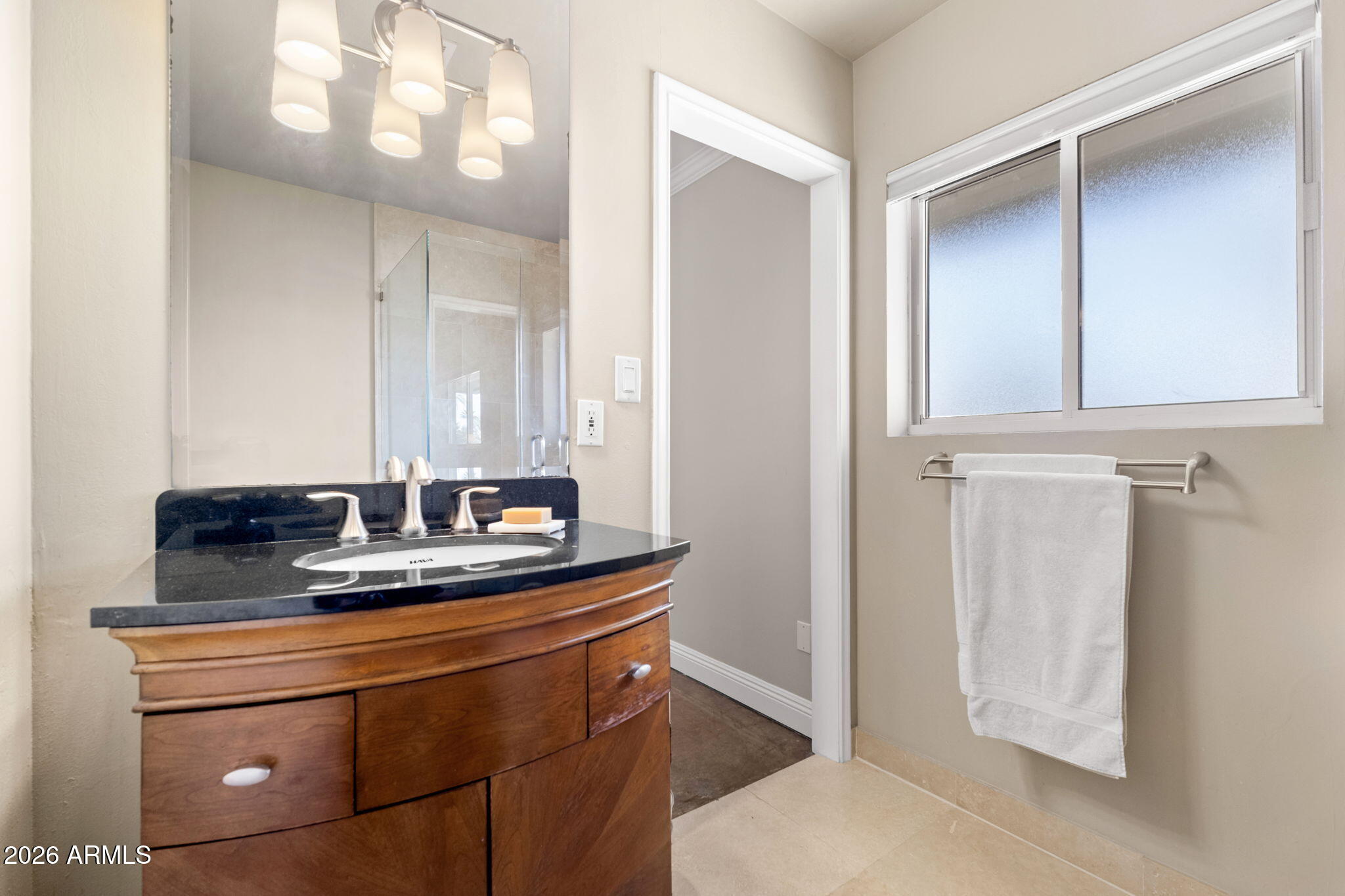 4901 North 82nd Street Scottsdale, AZ 85251 - Photo 23 of 48 a bathroom with a granite countertop sink and a mirror