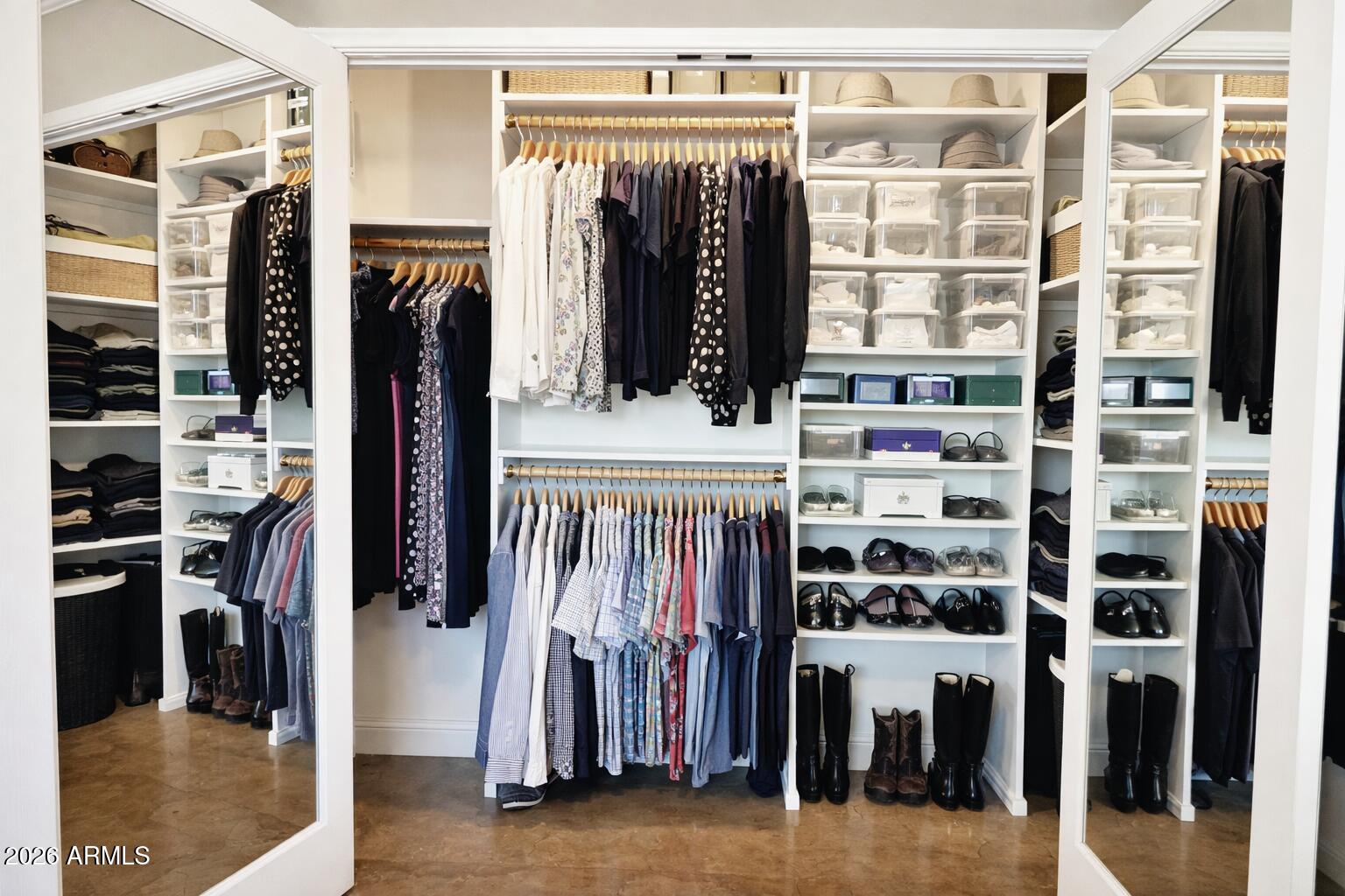 4901 North 82nd Street Scottsdale, AZ 85251 - Photo 24 of 48 a view of walk in closet with clothes and shoes