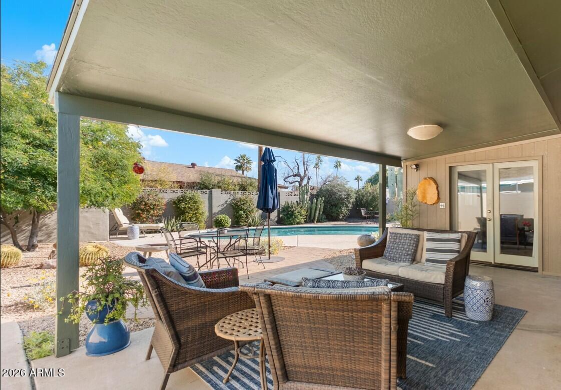 4901 North 82nd Street Scottsdale, AZ 85251 - Photo 6 of 48 a view of a patio with a table chairs and a patio