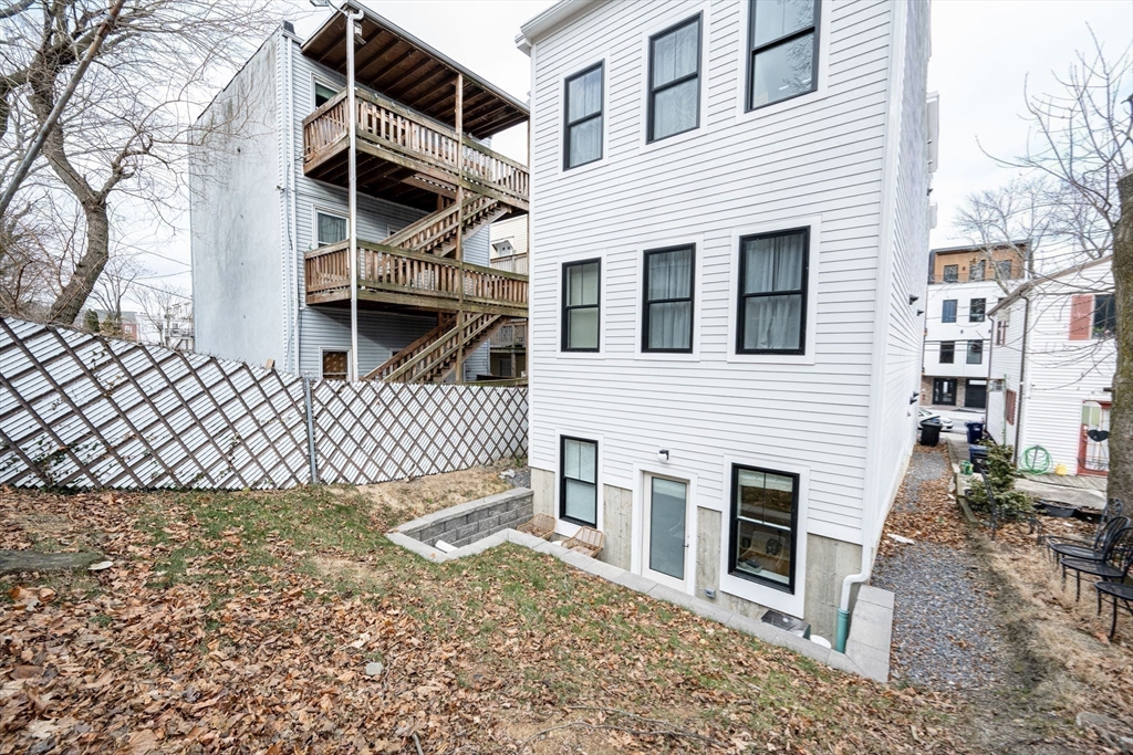 231 Everett Street, Unit 1 Boston, MA 02128 - Photo 31 of 39 a house that has a window in it
