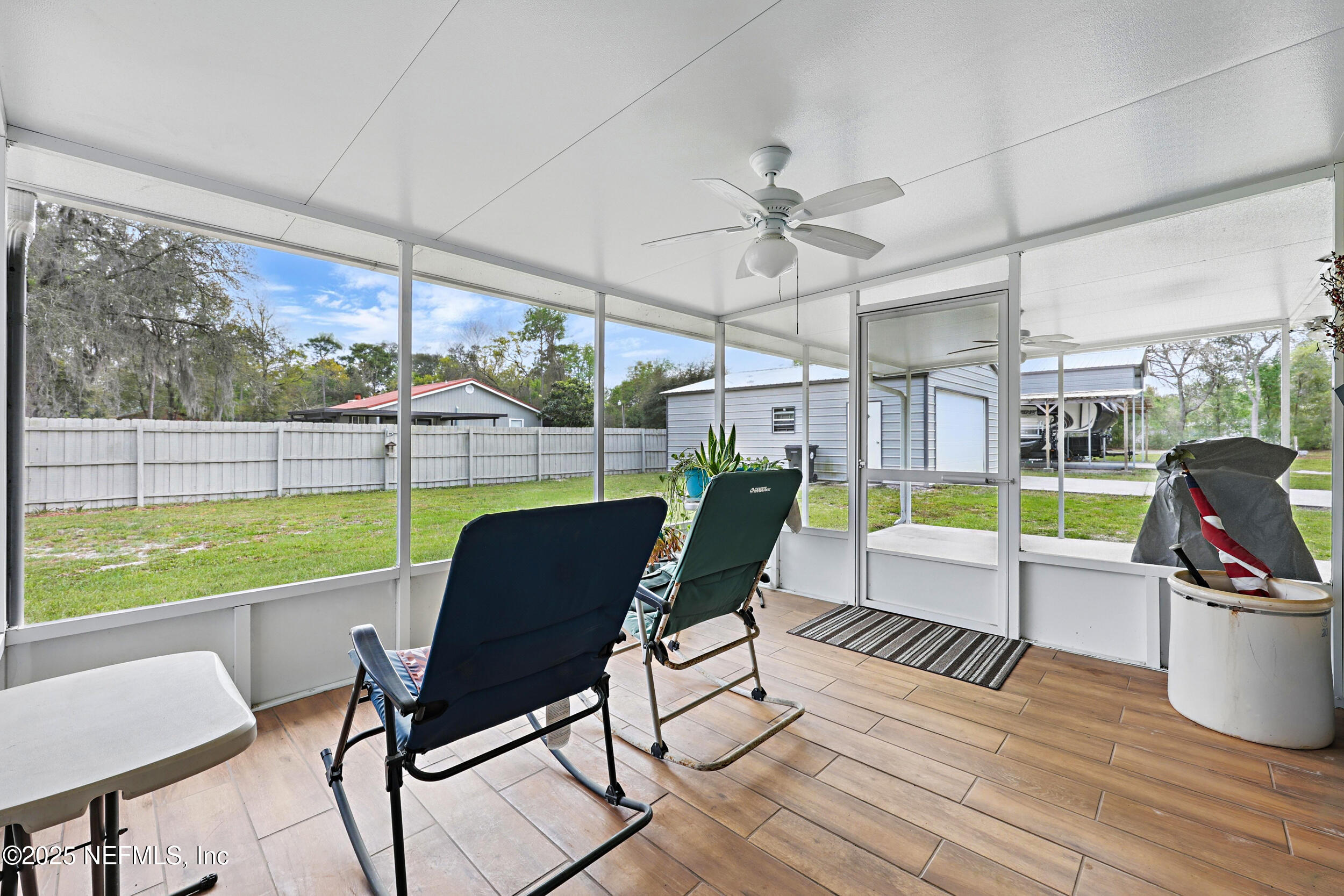 4575 Armadillo Street Middleburg, FL 32068 - Photo 20 of 37 Tile Floored Screened Porch