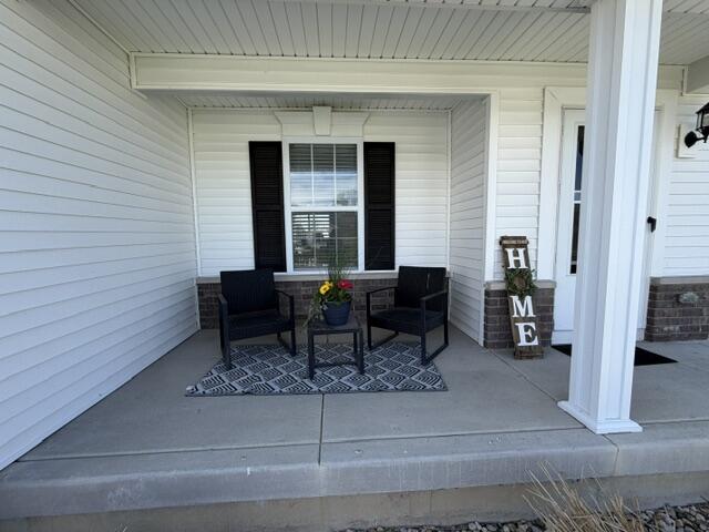 7480 Williams Street Merrillville, IN 46410 - Photo 44 of 49 a workspace with furniture and a potted plant