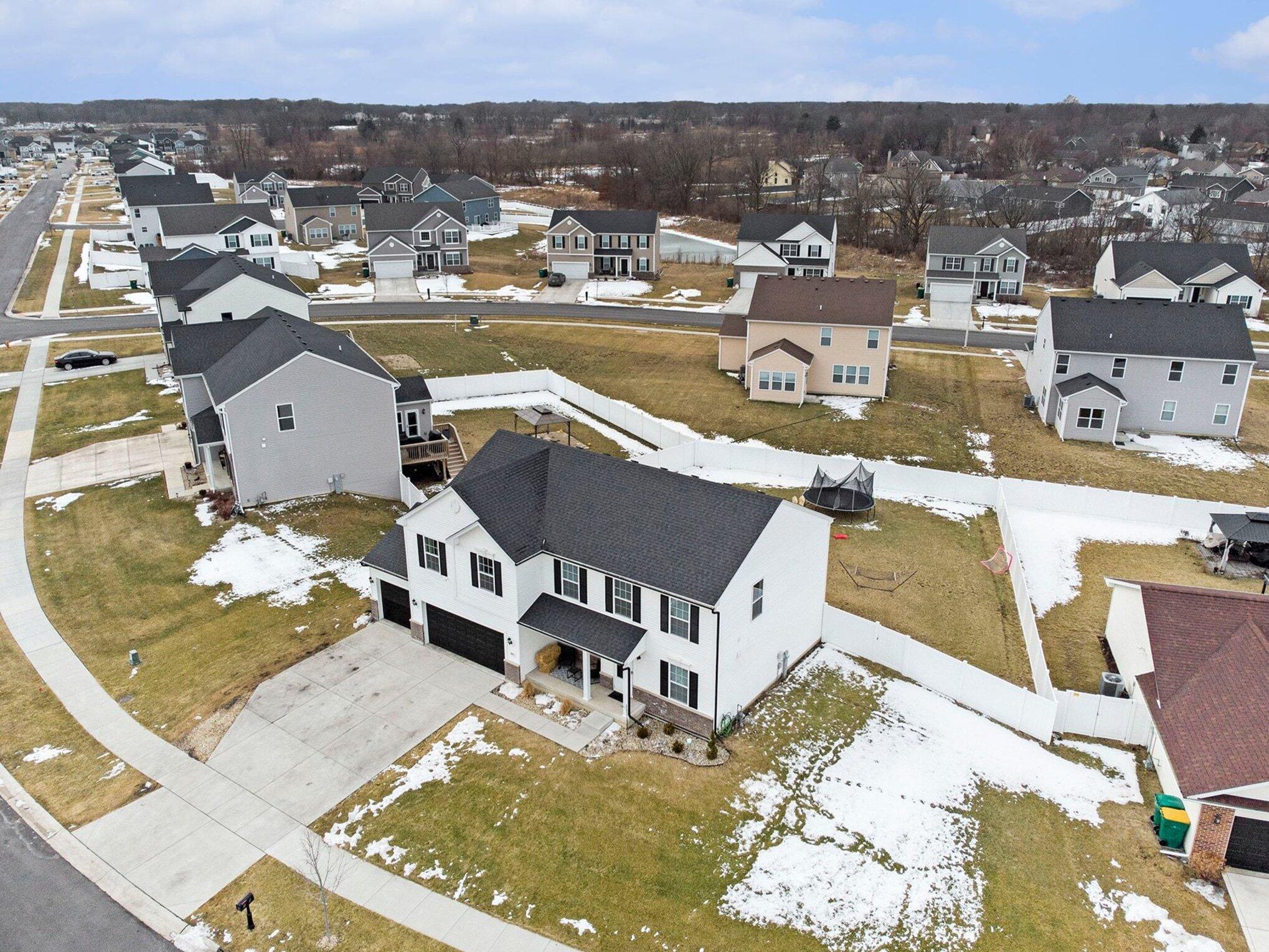 7480 Williams Street Merrillville, IN 46410 - Photo 47 of 49 an aerial view of a house with a swimming pool