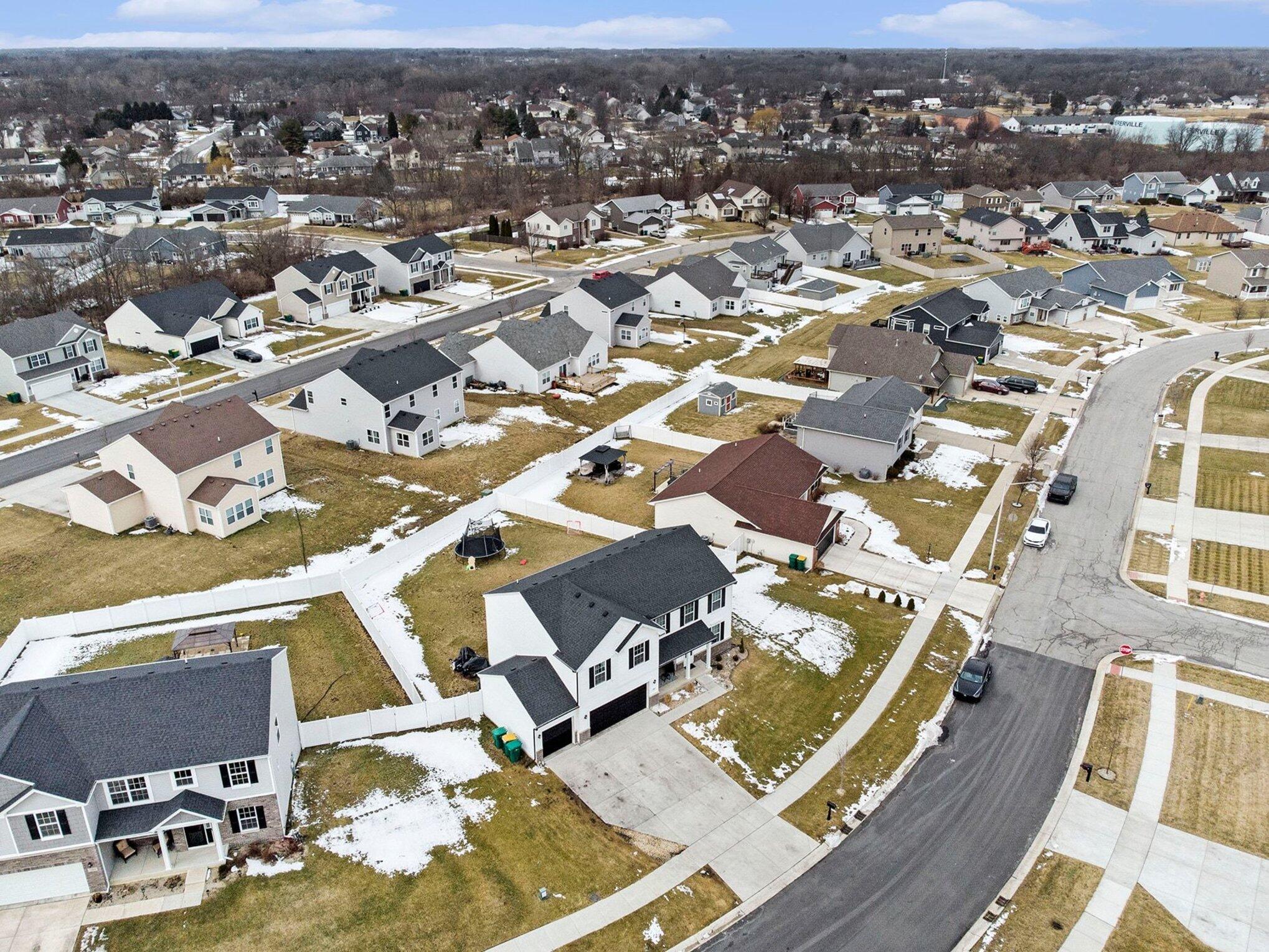 7480 Williams Street Merrillville, IN 46410 - Photo 49 of 49 an aerial view of a residential houses with parking