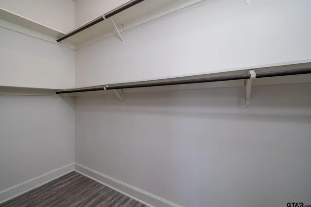 a view of a room with racks on the wall