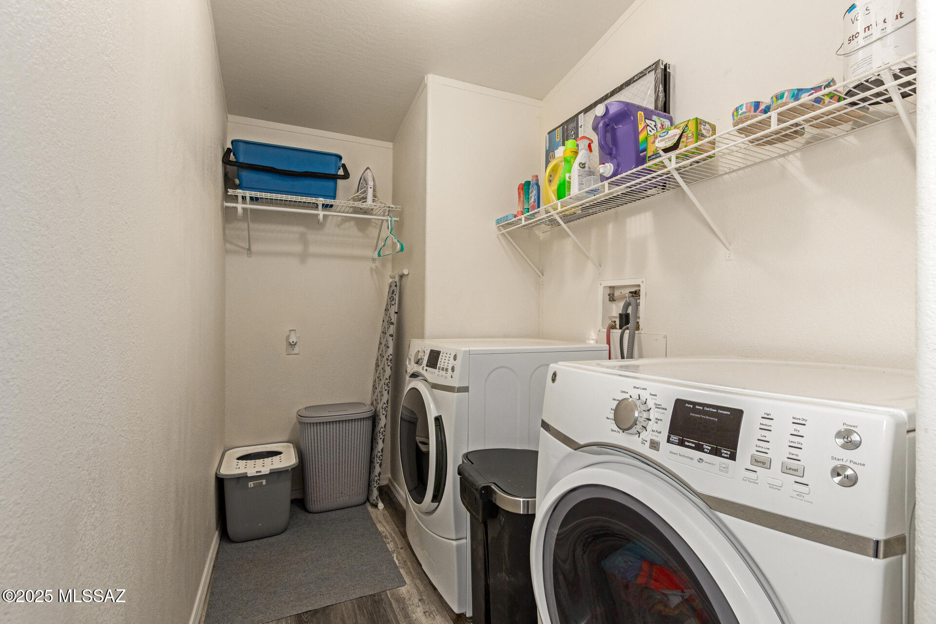 5386 North Whitetail Road Marana, AZ 85653 - Photo 28 of 33 a view of storage and utility room with washer and dryer