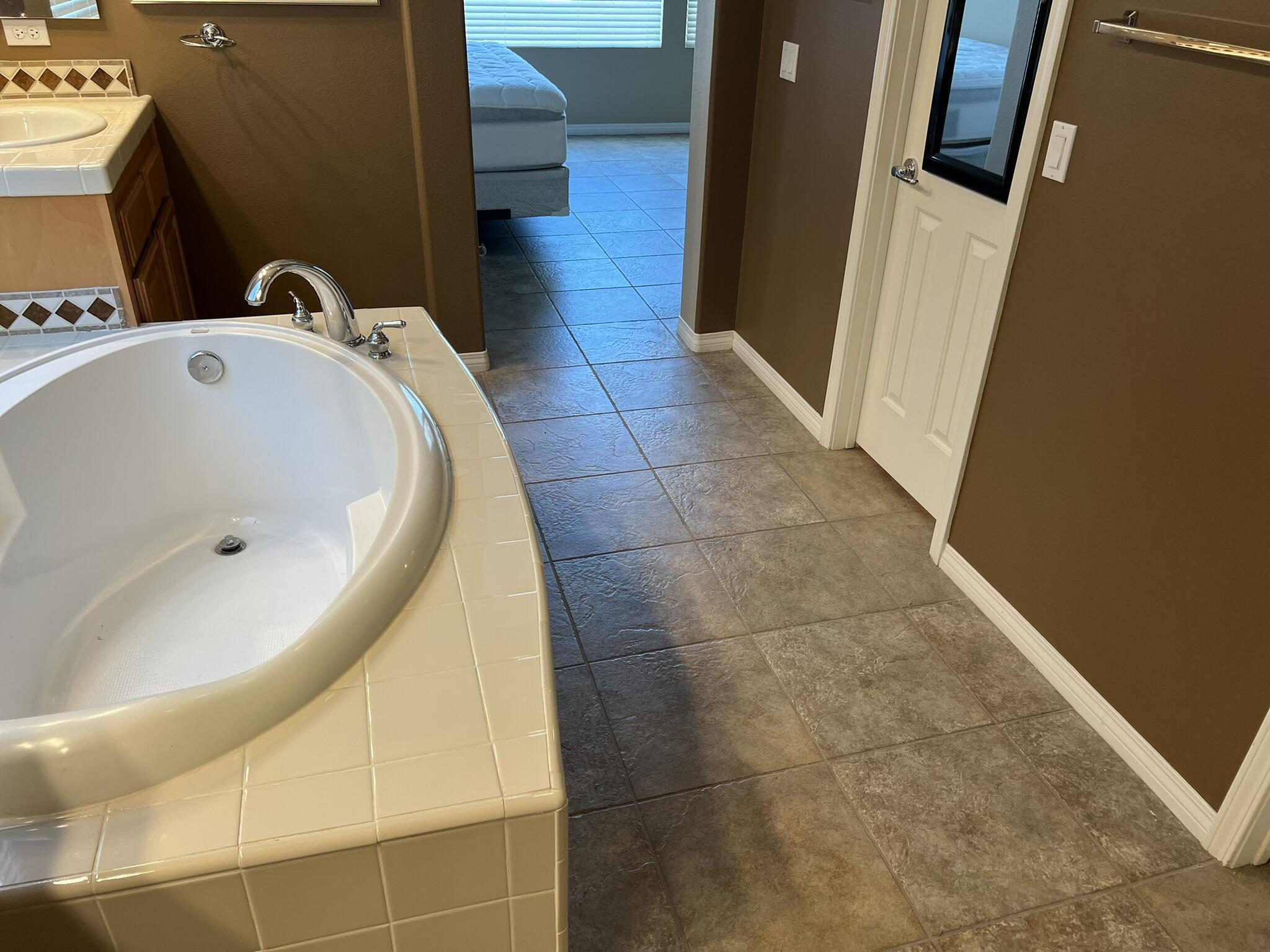 59 Shoreline Drive Rancho Mirage, CA 92270 - Photo 34 of 56 a bathroom with a tub and sink