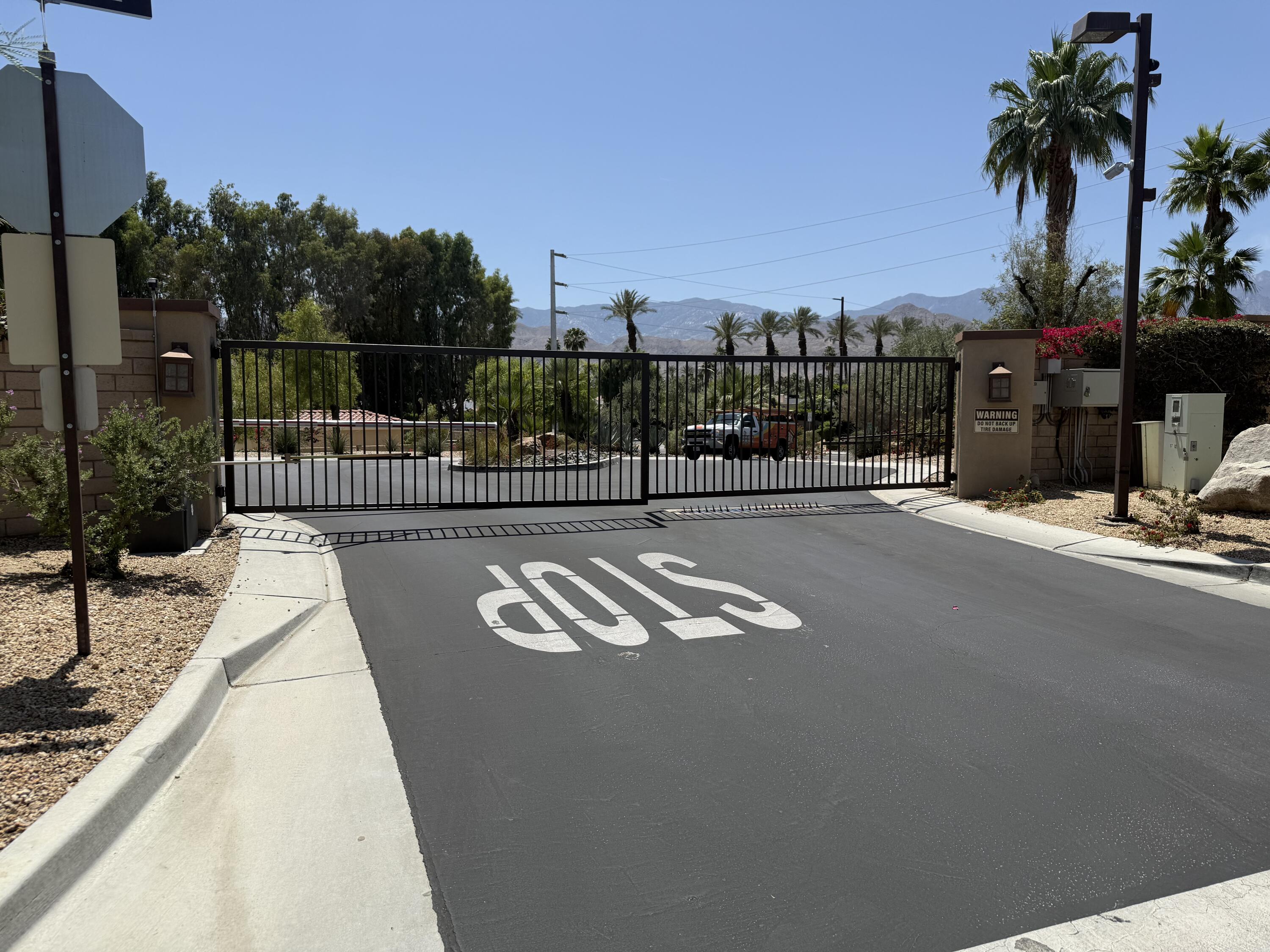 59 Shoreline Drive Rancho Mirage, CA 92270 - Photo 56 of 56 a view of a terrace with glass door