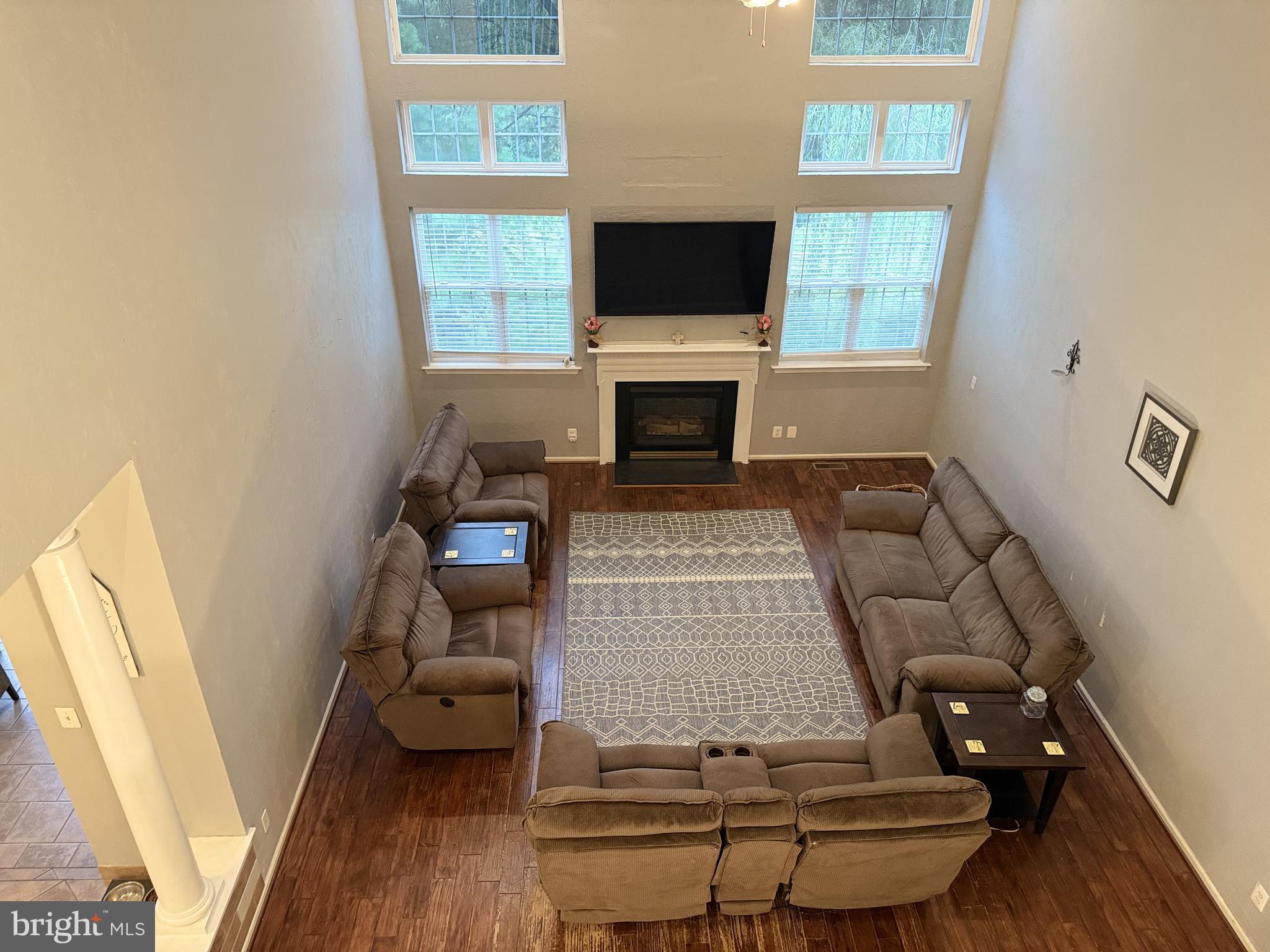 135 Juniper Lane Swedesboro, NJ 08085 - Photo 14 of 40 a living room with furniture and a fireplace