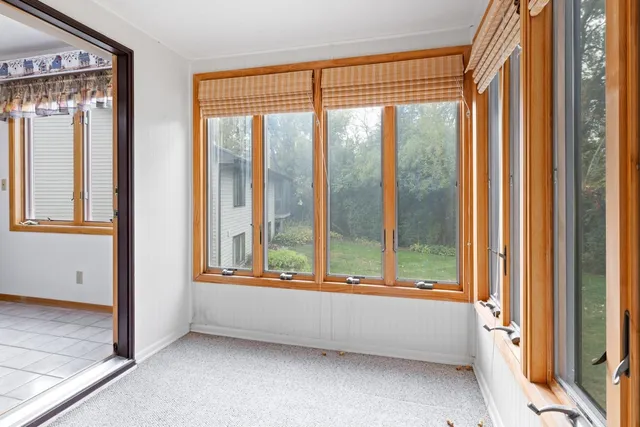 a bathroom with a large tub and shower