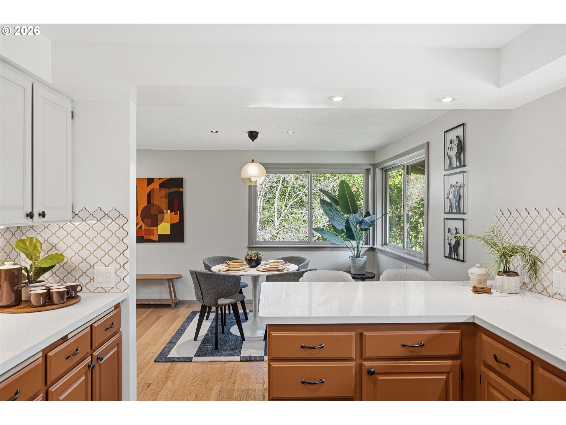 12802 Southeast Knapp Street Portland, OR 97236 - Photo 18 of 48 a kitchen with stainless steel appliances a sink a counter top space and a window