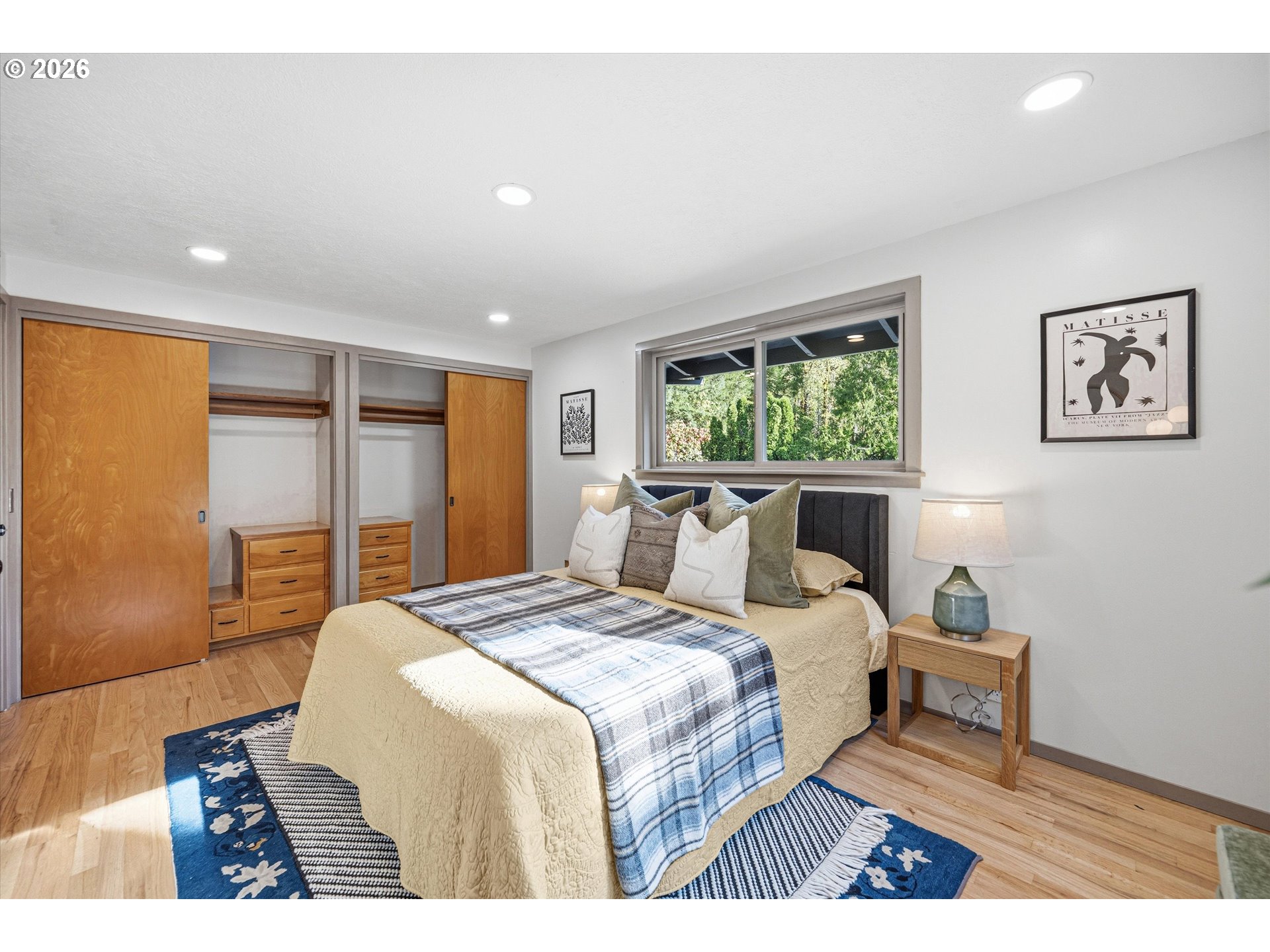 12802 Southeast Knapp Street Portland, OR 97236 - Photo 21 of 48 a bedroom with a bed and a large window