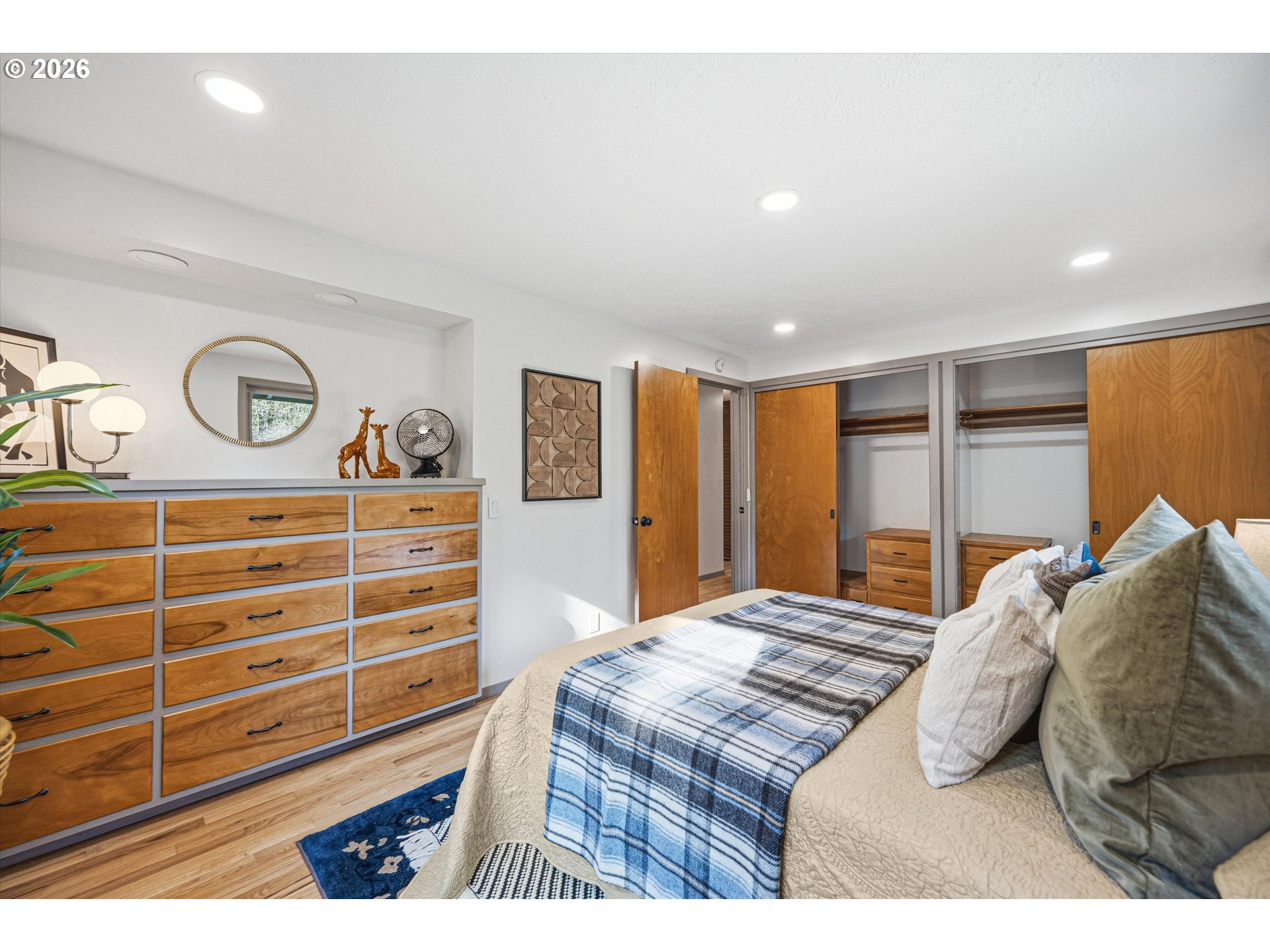 12802 Southeast Knapp Street Portland, OR 97236 - Photo 23 of 48 a bedroom with a bed and a closet
