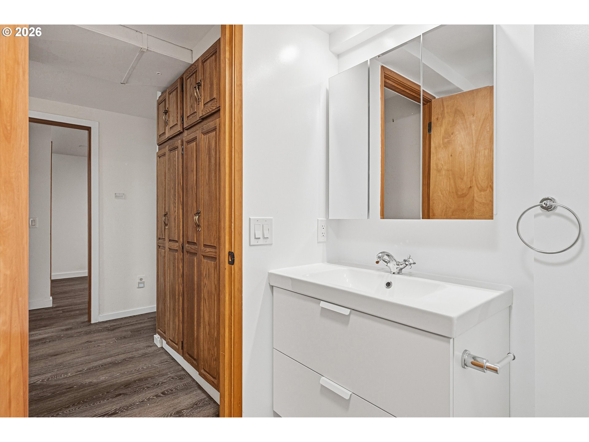 12802 Southeast Knapp Street Portland, OR 97236 - Photo 34 of 48 a bathroom with a sink a mirror and a shower