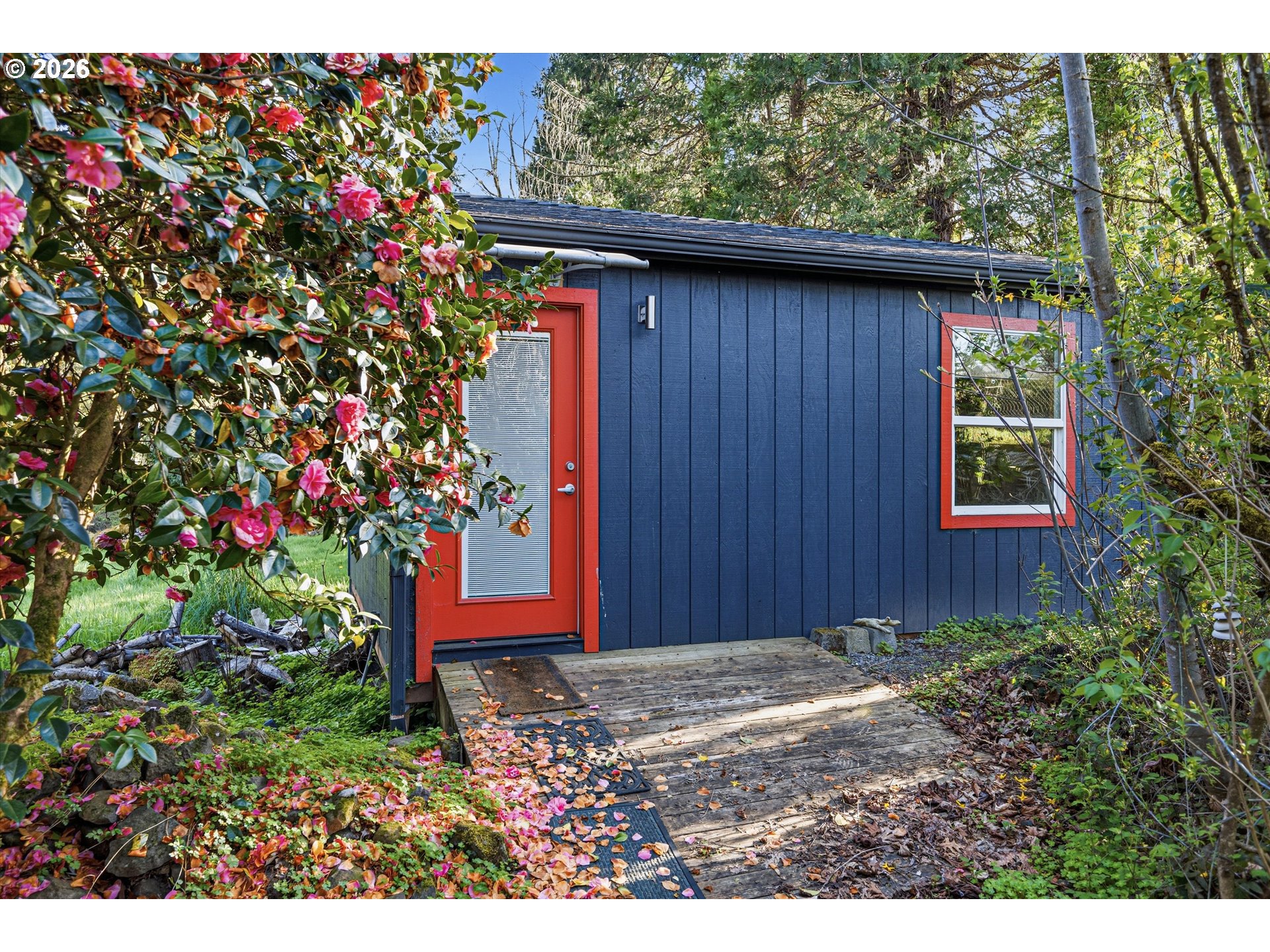 12802 Southeast Knapp Street Portland, OR 97236 - Photo 38 of 48 a front view of a house with a pathway