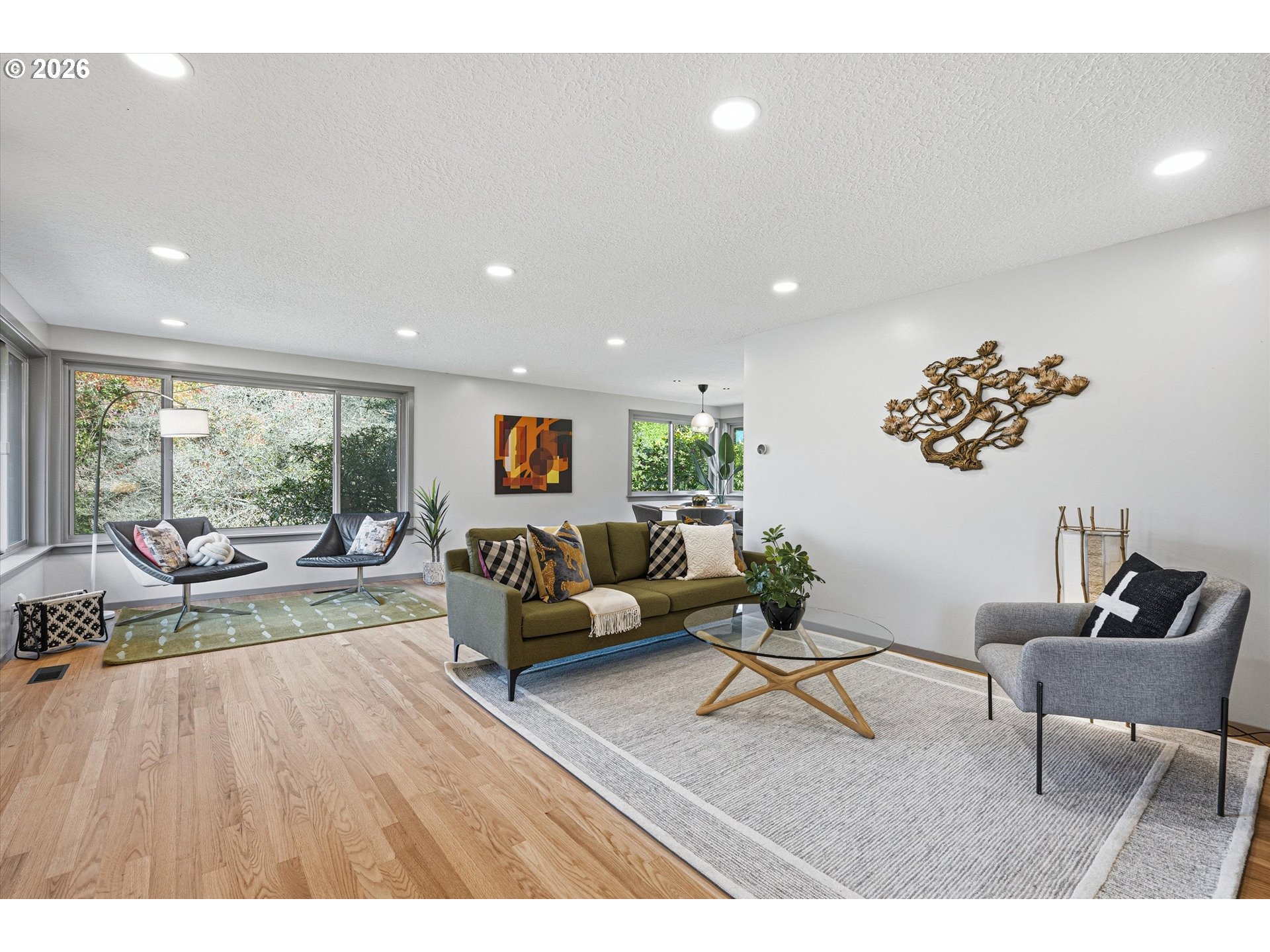 12802 Southeast Knapp Street Portland, OR 97236 - Photo 4 of 48 a living room with furniture and a large window