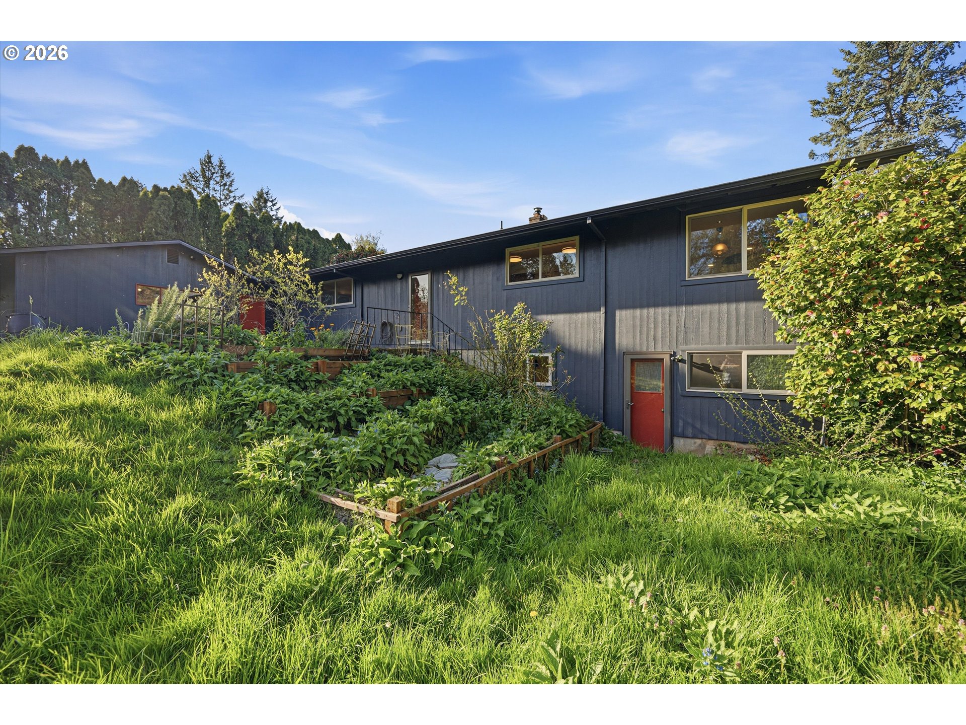 12802 Southeast Knapp Street Portland, OR 97236 - Photo 41 of 48 a backyard of a house with lots of green space
